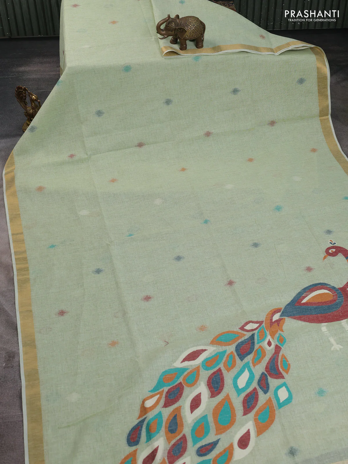 Linen cotton saree pista green with allover thread woven buttas and peacock pallu - Image 4