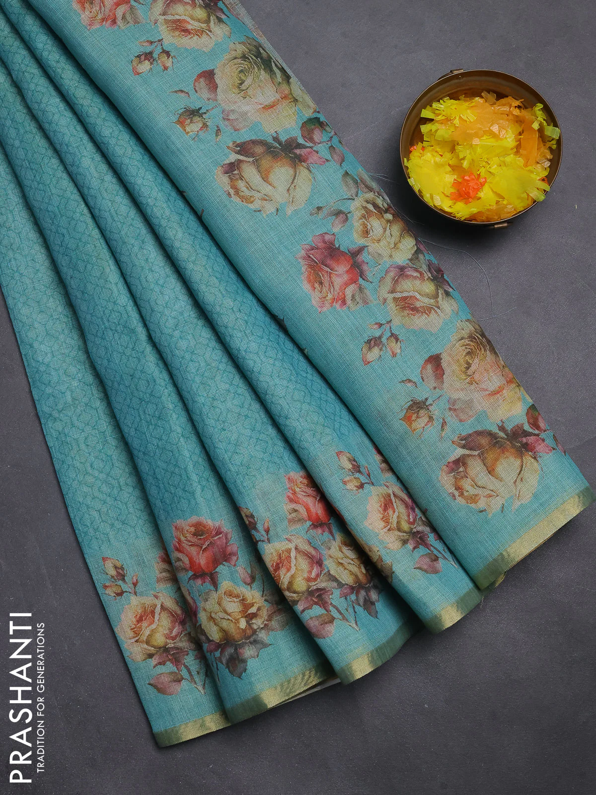 Linen cotton saree teal blue with allover prints and printed border