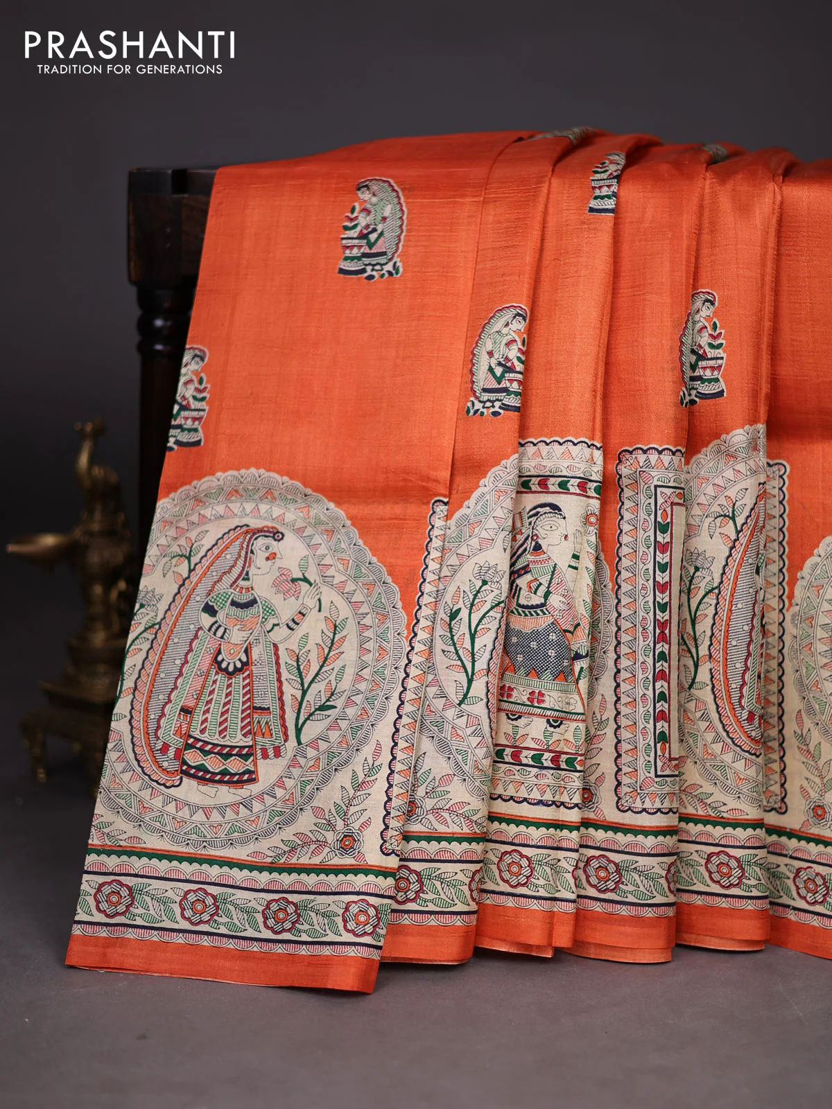 Madhubani printed silk saree orange and cream with butta prints and madhubani printed border