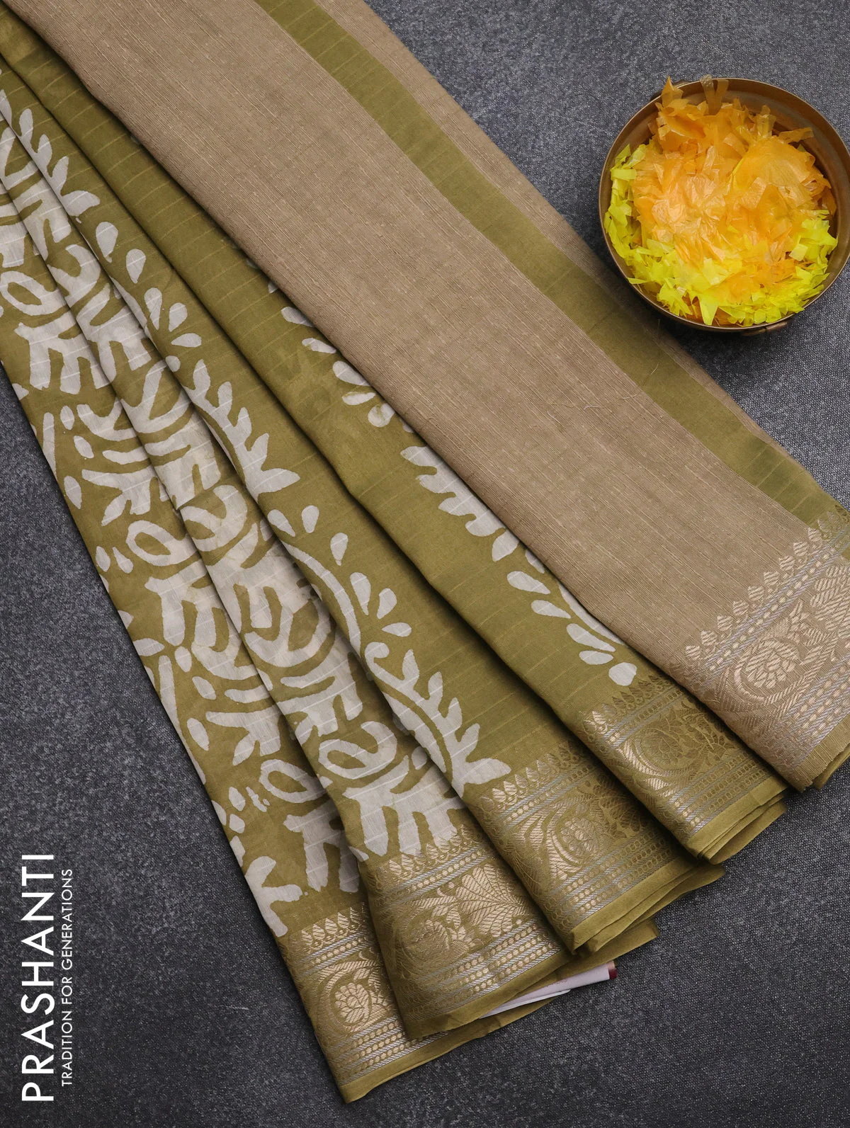 Maheshwari silk cotton saree elaichi green with batik prints and zari woven border
