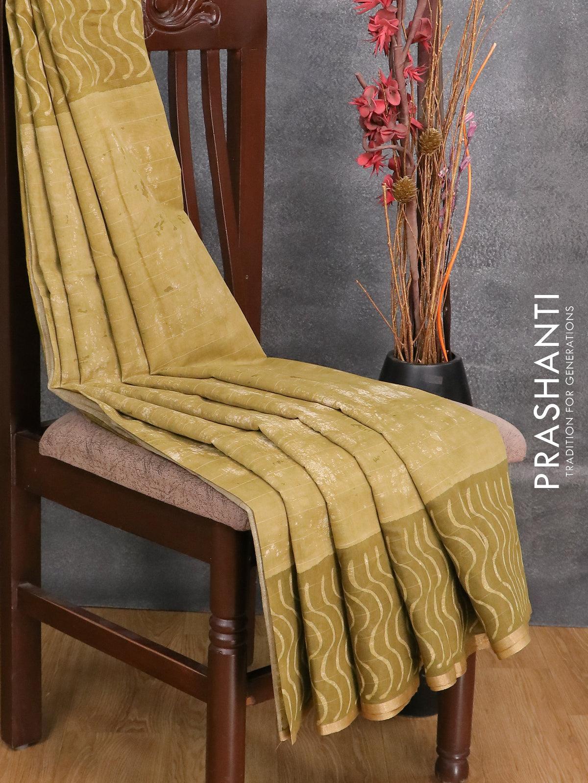 Maheshwari silk cotton saree mehendi green with allover batik prints and zari woven piping border - Image 2