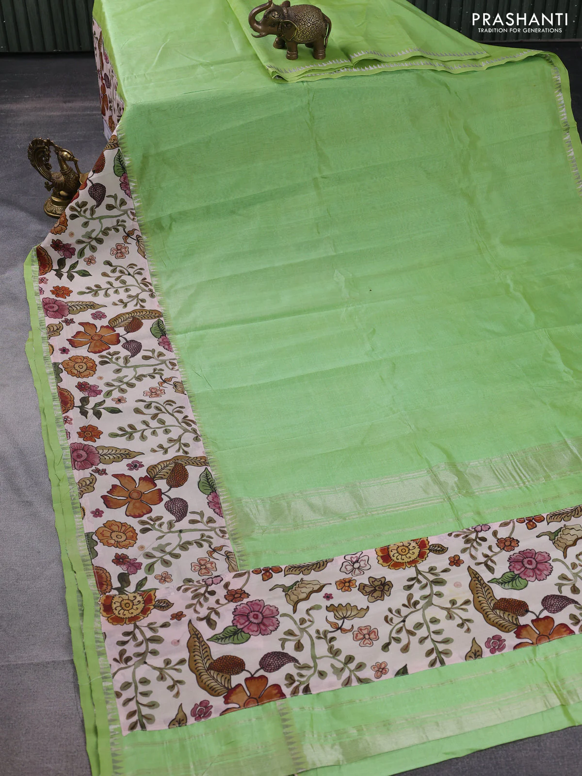 Mangalgiri silk cotton saree pista green and pastel peach with plain body and long kalamkari printed applique border - Image 2