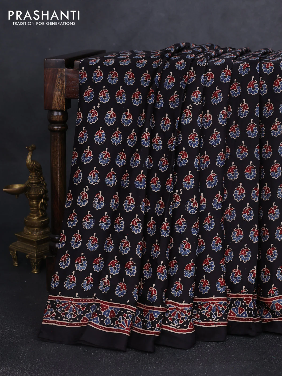 Modal silk saree black with allover ajrakh prints and sequin embroidered work pallu