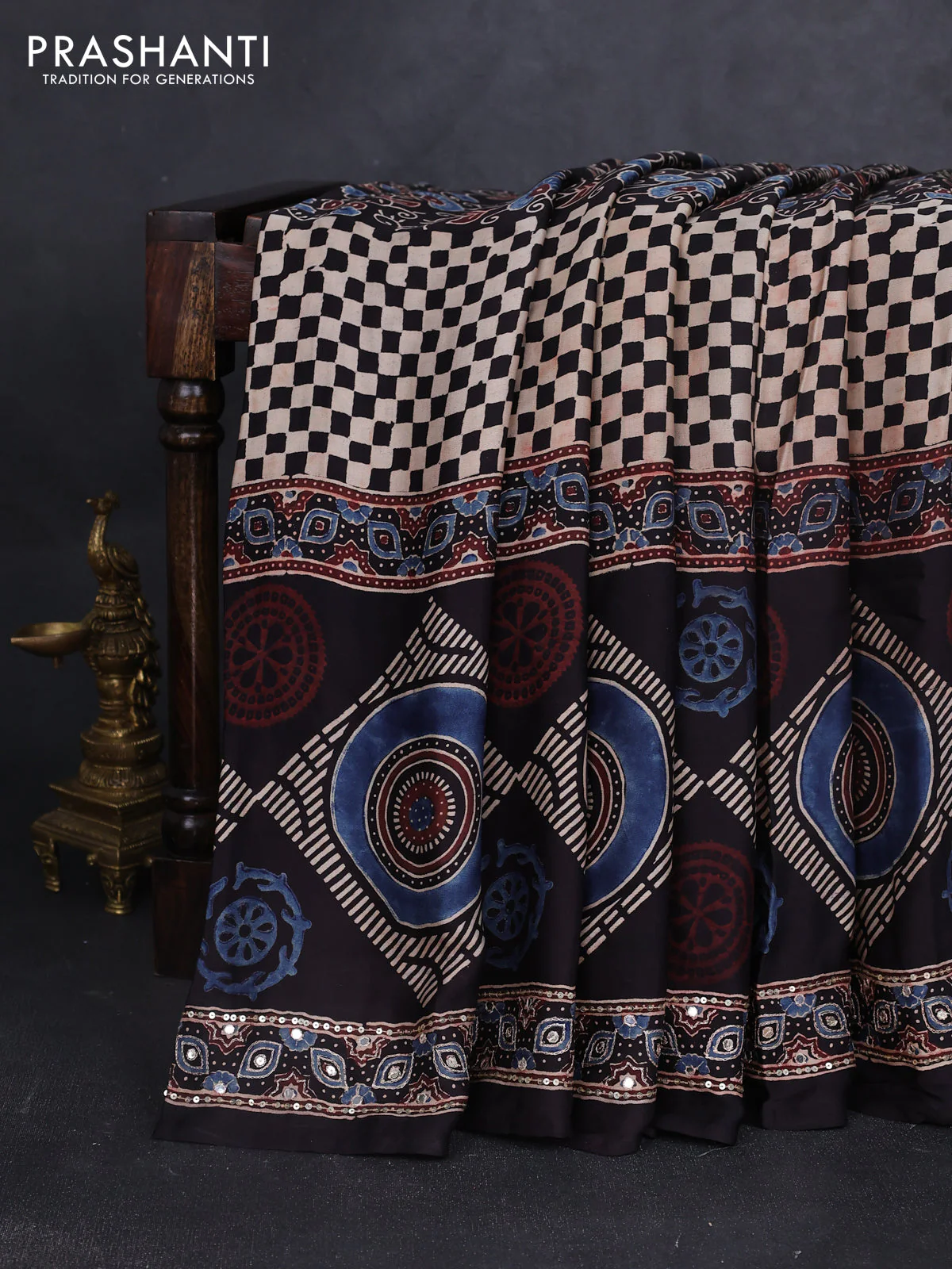 Modal silk saree black with allover ajrakh prints and sequin embroidered work pallu