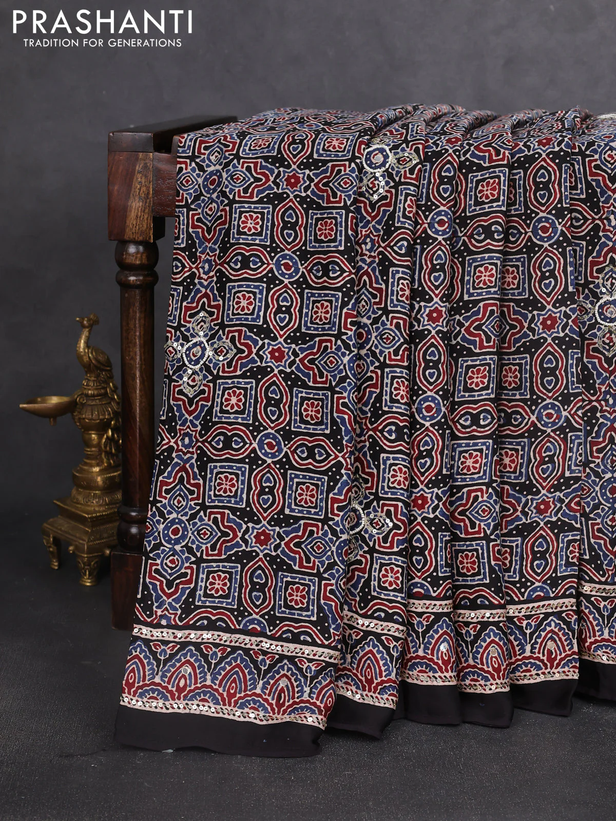 Modal silk saree black with allover ajrakh prints & sequin work and sequin embroidered work pallu