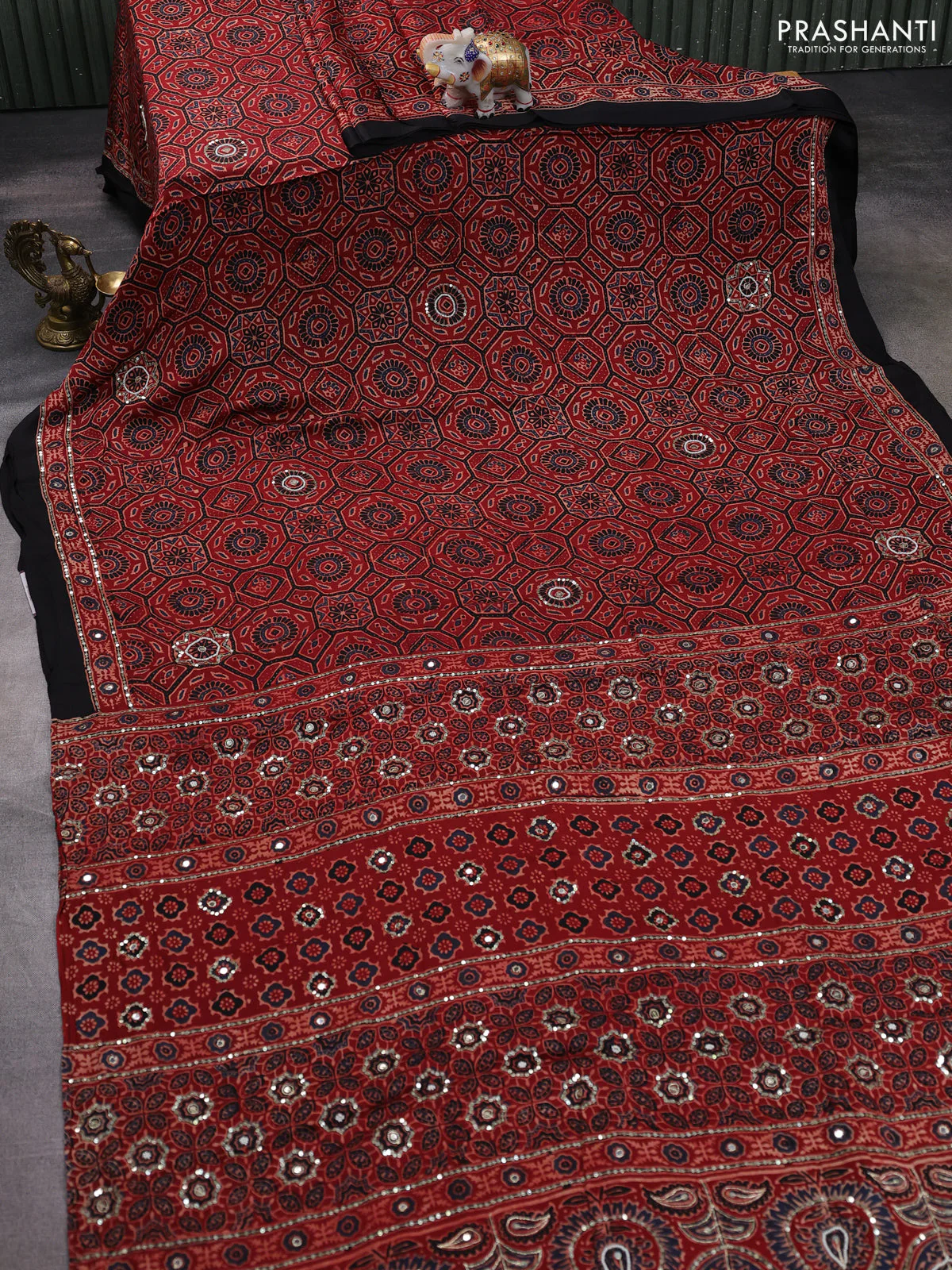 Modal silk saree maroon and black with allover ajrakh prints & mirror work and sequin embroidered work pallu - Image 2