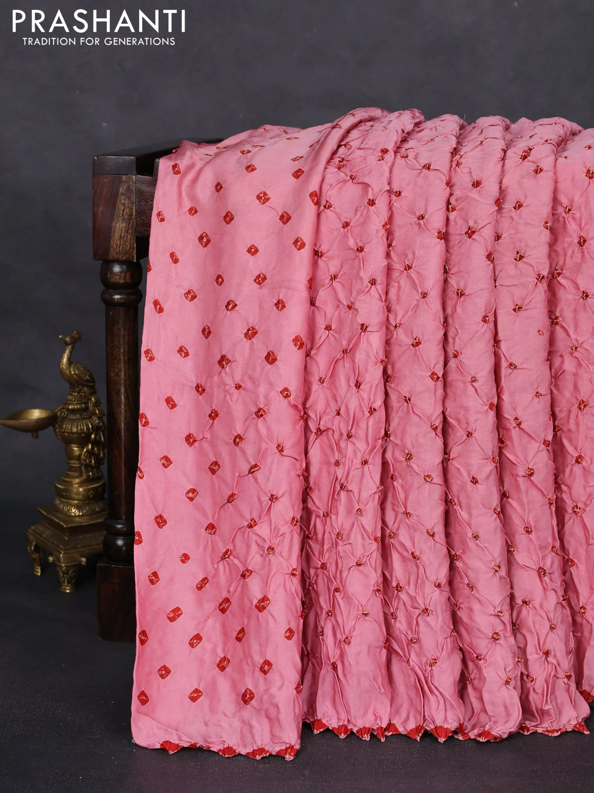 Modal silk saree peach pink and peacock blue with allover bandhani butta prints and ajrakh printed pallu & Blouse - Image 2