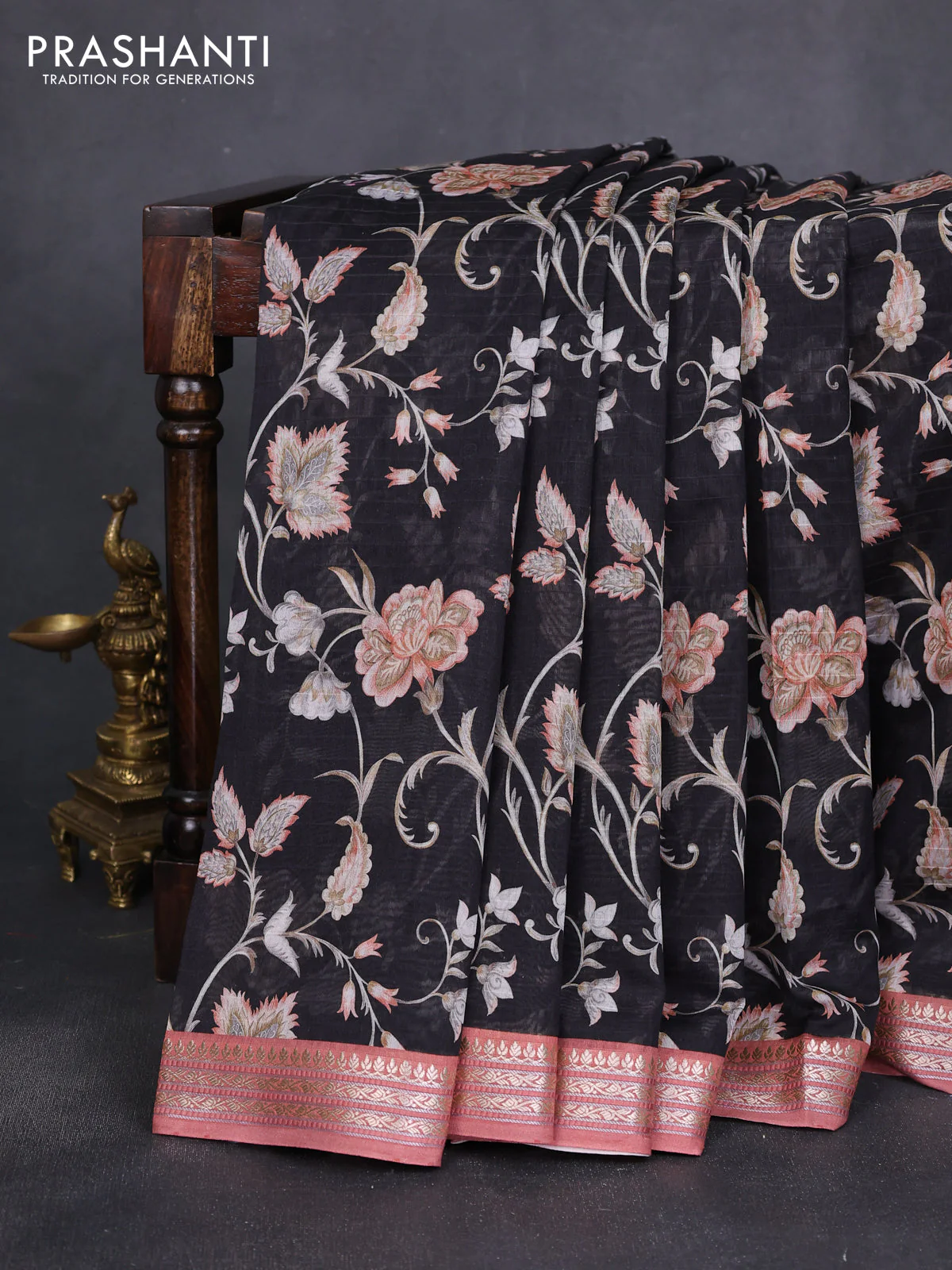 Mul chanderi saree black and pastel peach with allover digital prints and zari woven border