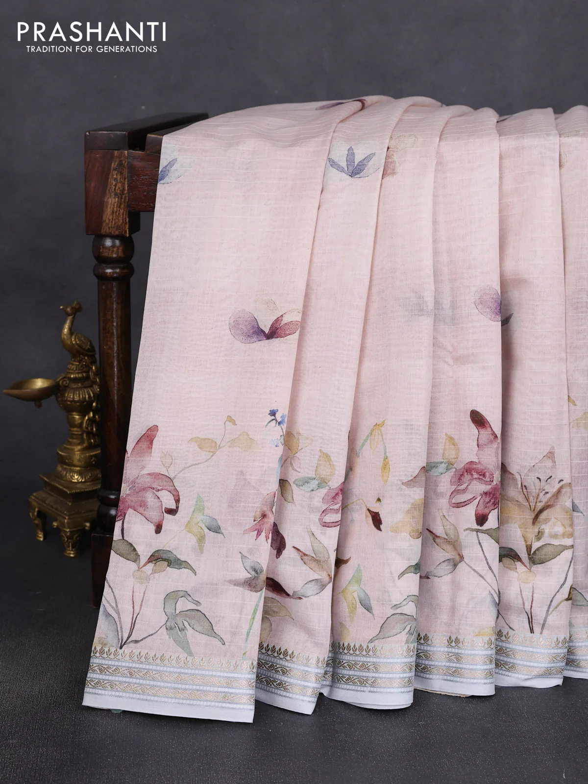 Mul chanderi saree pastel peach and pastel blue shade with allover floral digital prints and zari woven border