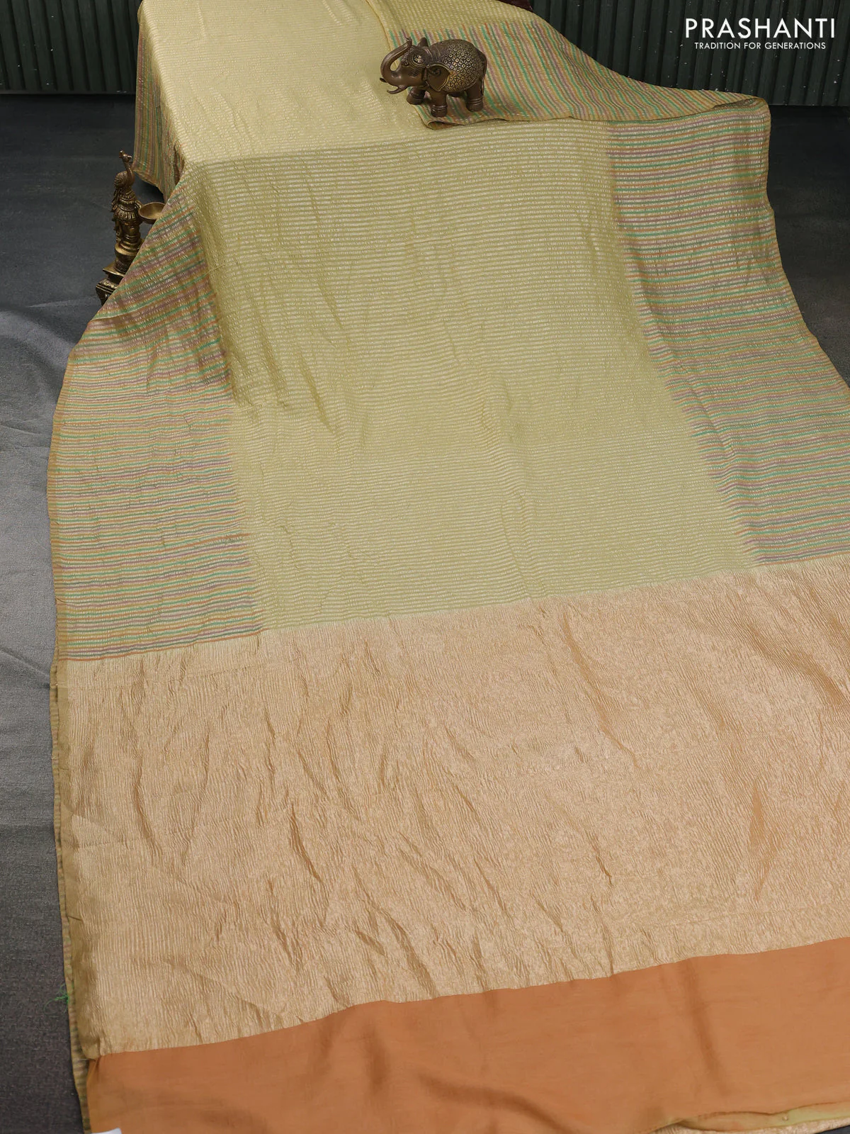 Munga silk saree pale yellow with allover zari woven stripes pattern in borderless style - Image 2