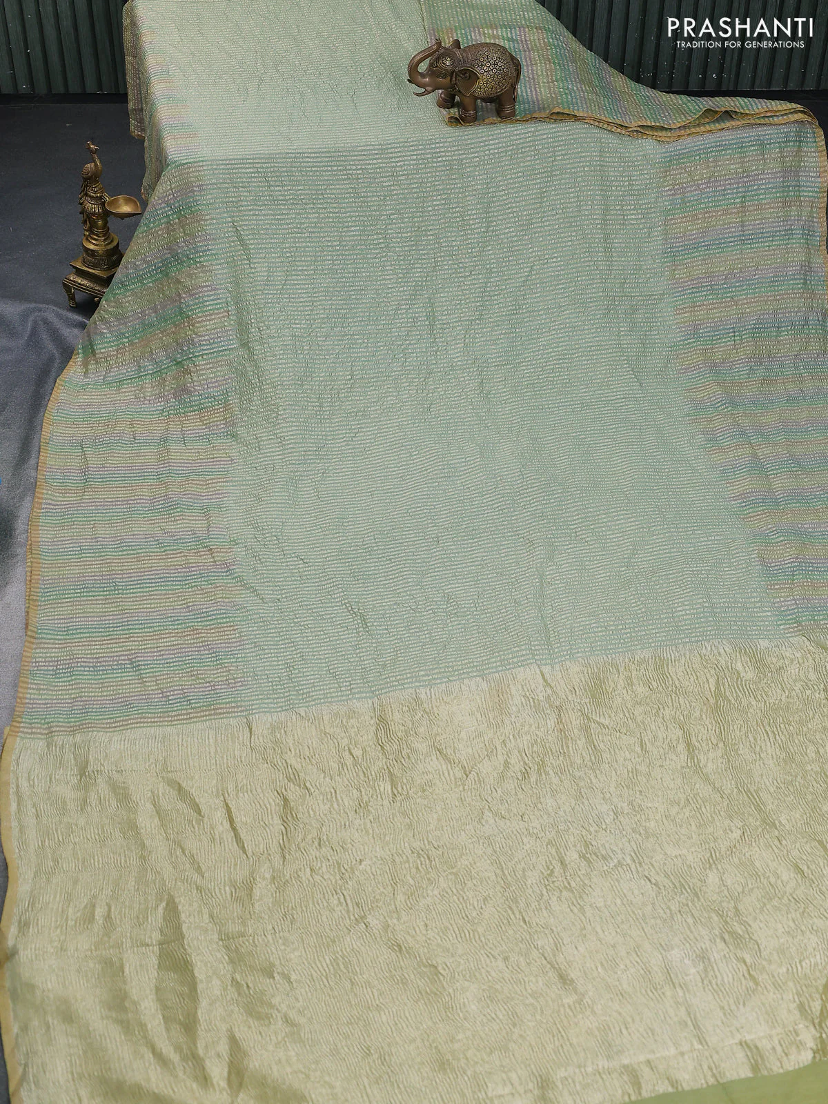 Munga silk saree pastel green and multi colour with allover zari woven stripes pattern in borderless style - Image 2