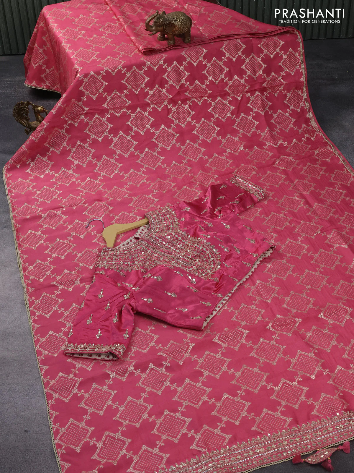 Munga tussar saree pink shade with allover zari weaves and lace work border