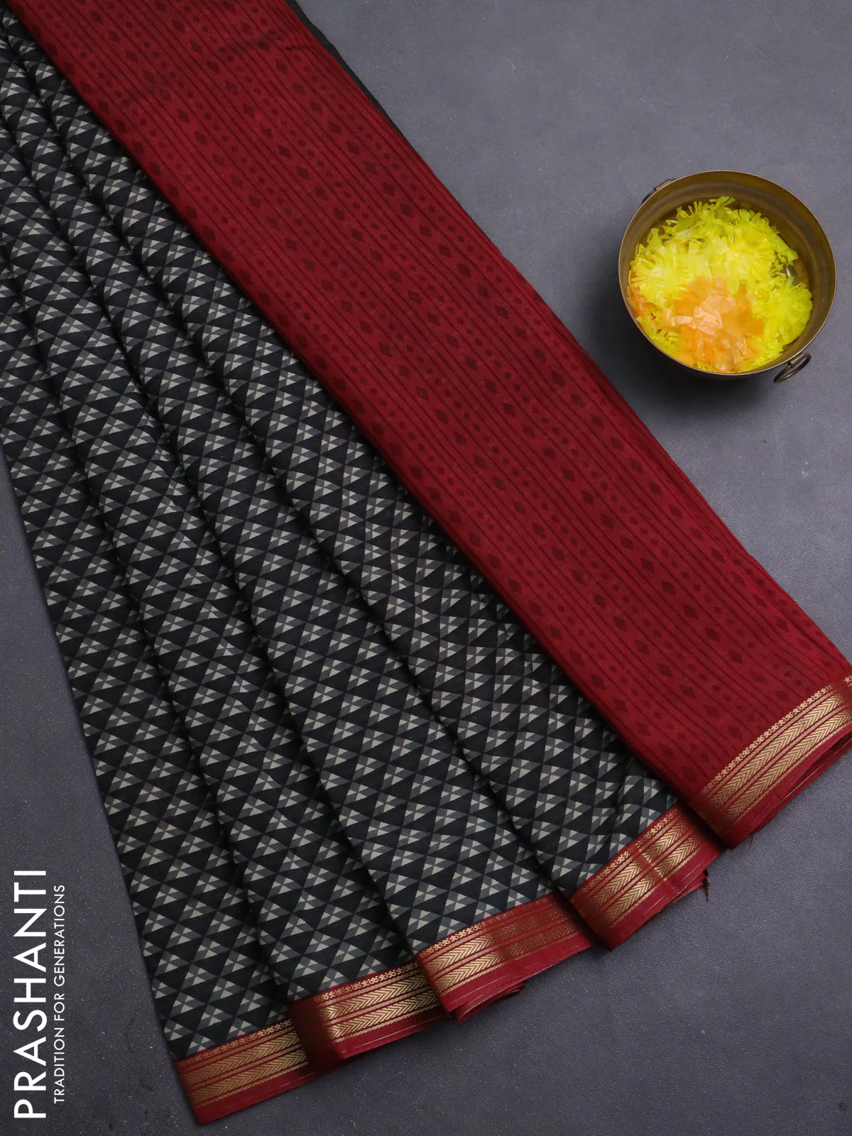 Muslin silk saree black and maroon with allover geometric prints and zari woven border