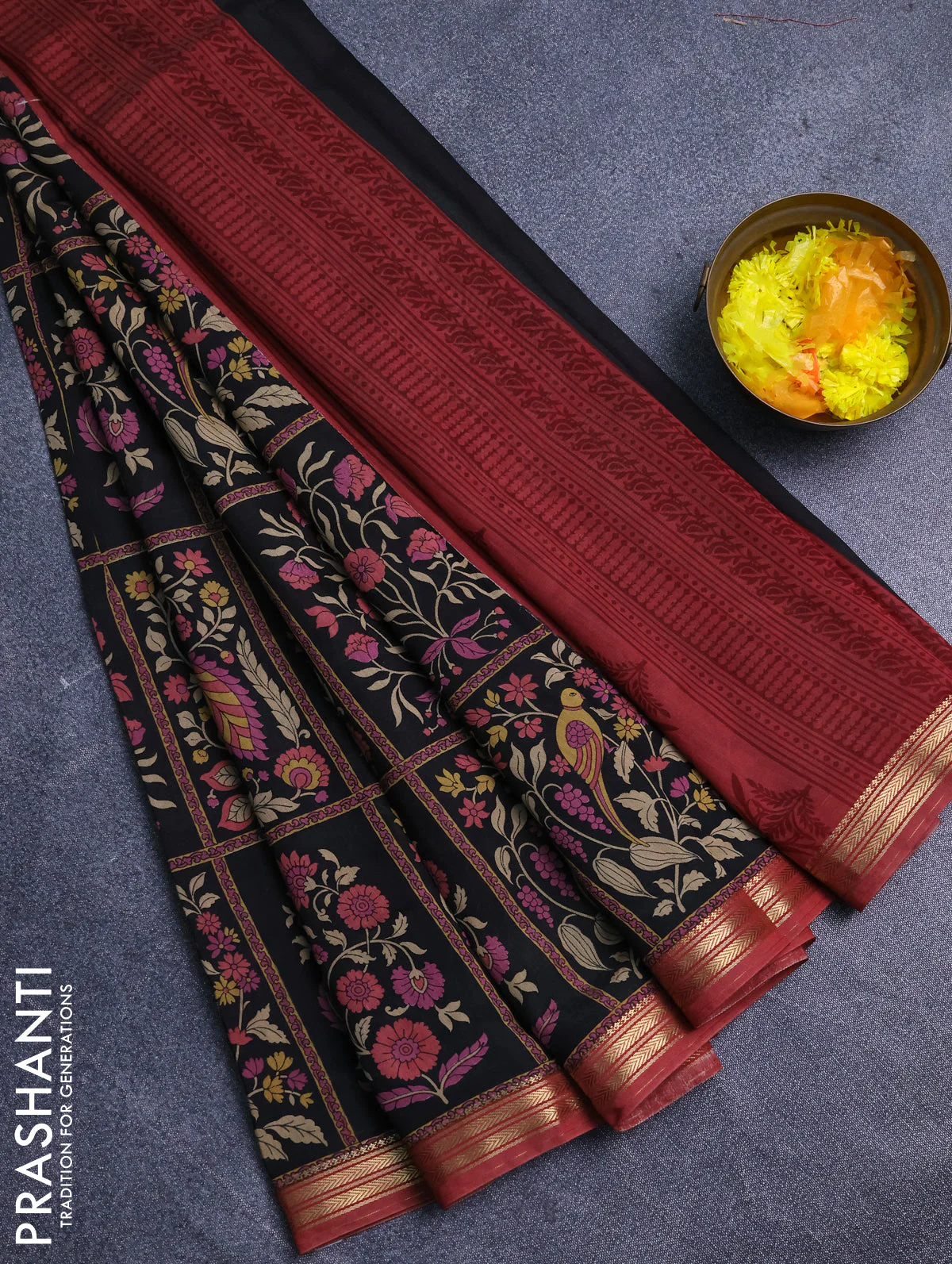 Muslin silk saree black and pastel maroon with allover prints and zari woven border