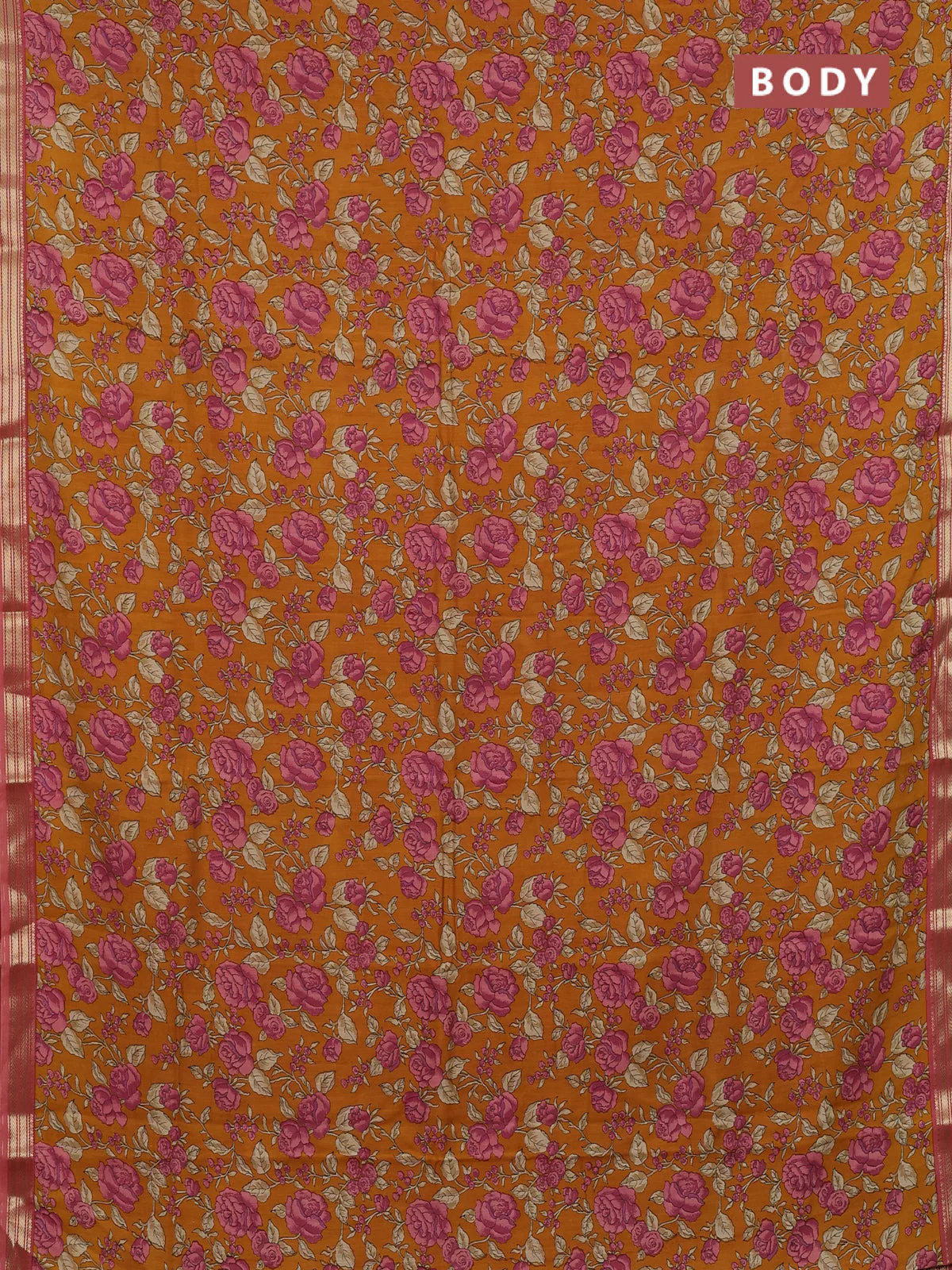 Muslin silk saree dark mustard and peach shade with allover floral prints and zari woven border - Image 2