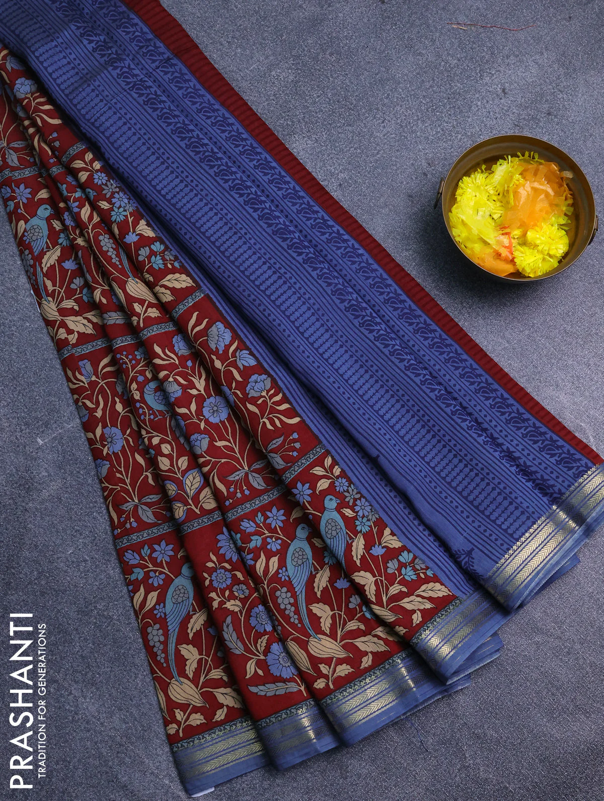 Muslin silk saree maroon and bluish grey with allover prints and zari woven border