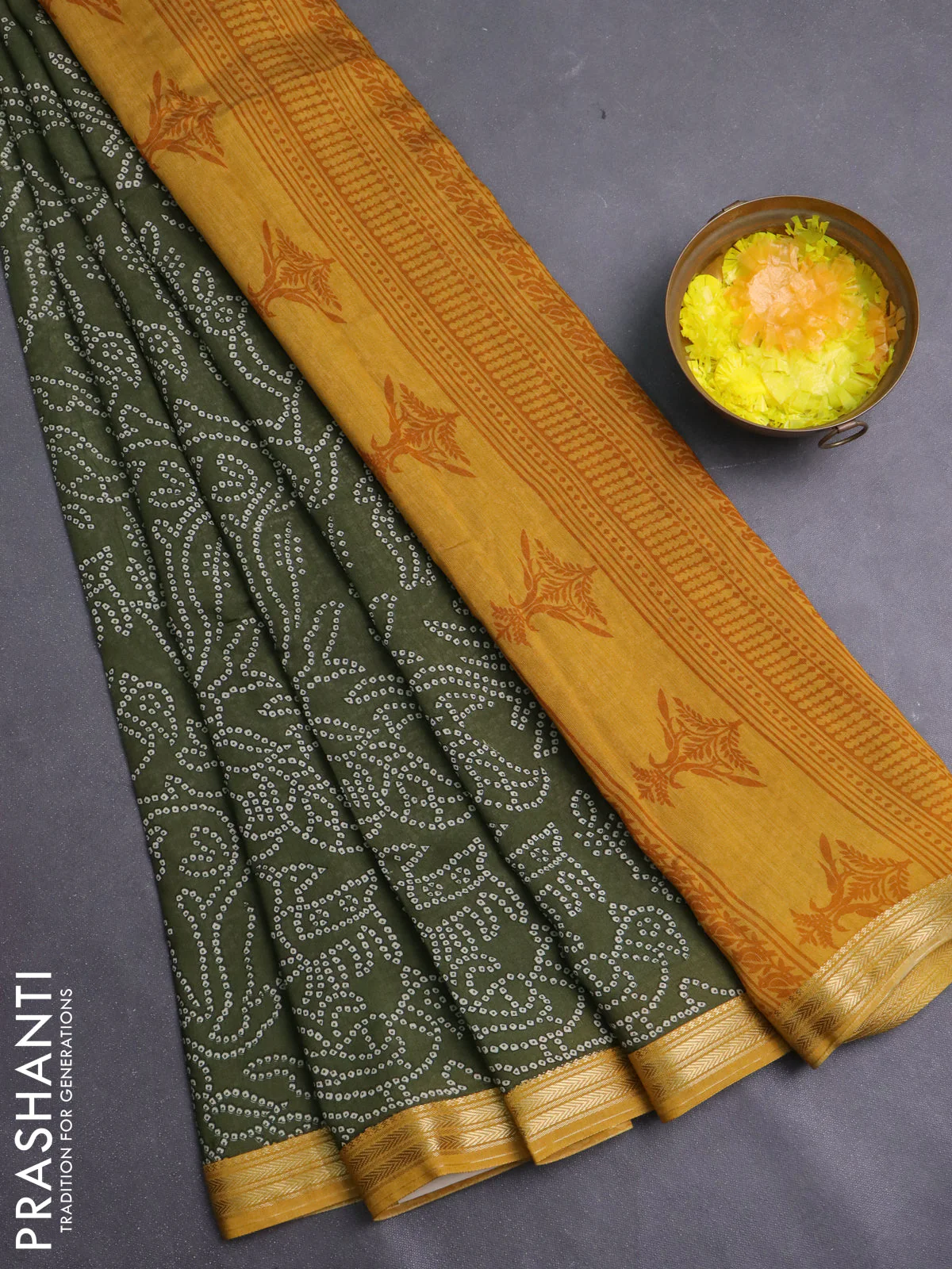 Muslin silk saree sap green and mustard yellow with allover bandhani prints and zari woven border