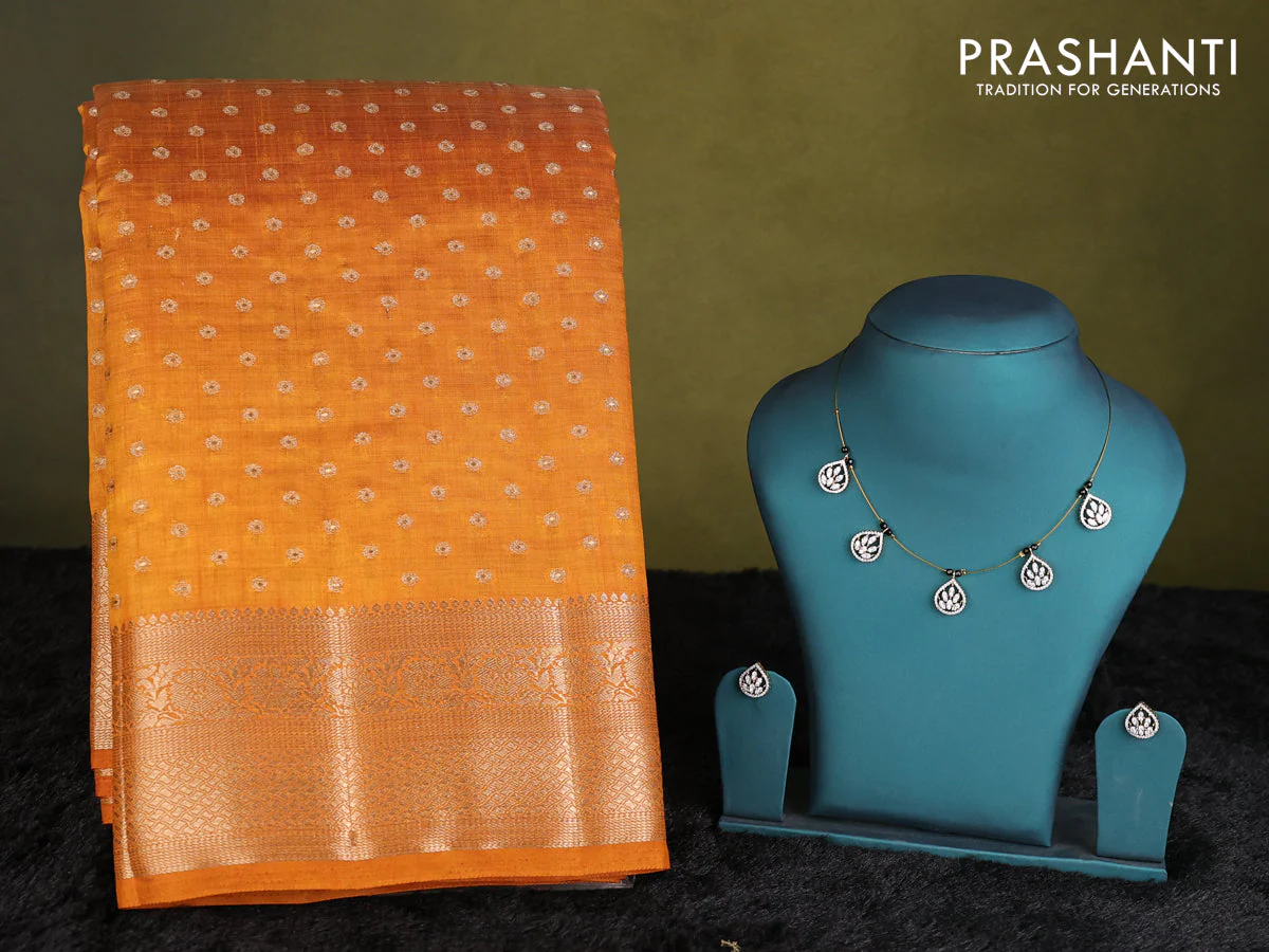 Mustard yellow raw silk saree with matching Neck piece