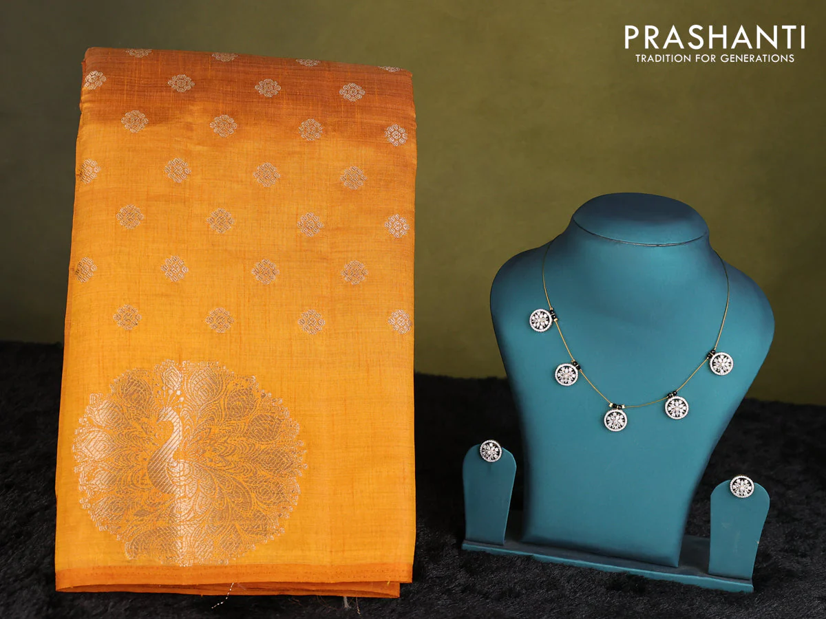 Mustard yellow raw silk saree with matching Neck piece