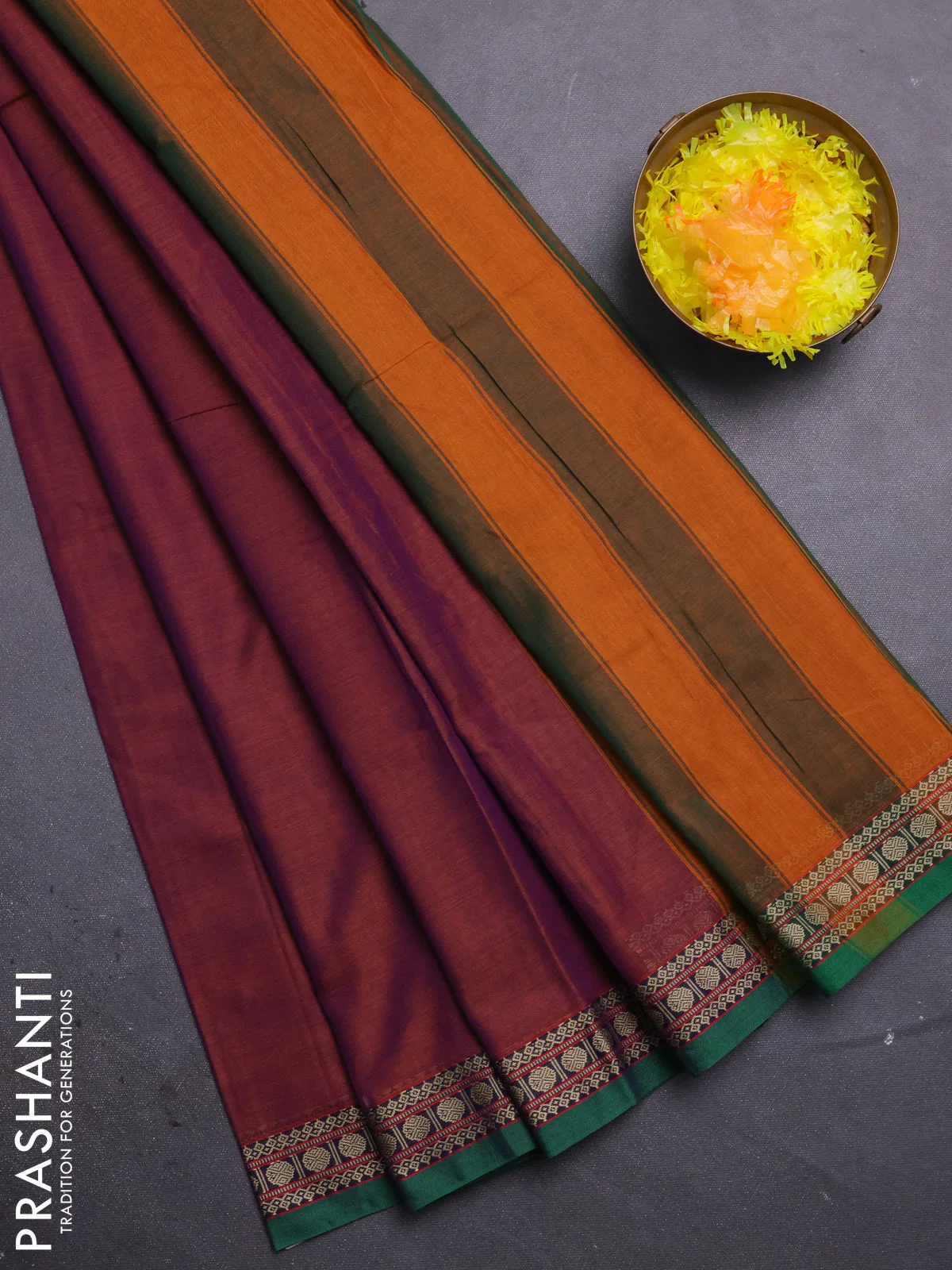 Narayanpet cotton saree dual shade of rust and green with plain body and thread woven butta border