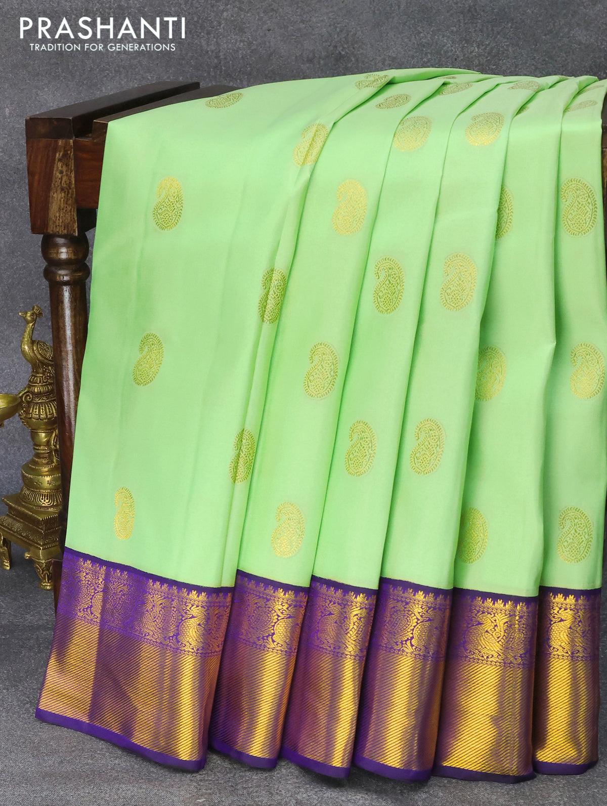 Niraa-2 Pure kanjivaram silk saree pista green and navy blue with allover zari woven paisley buttas and rich annam zari woven korvai border - Image 3