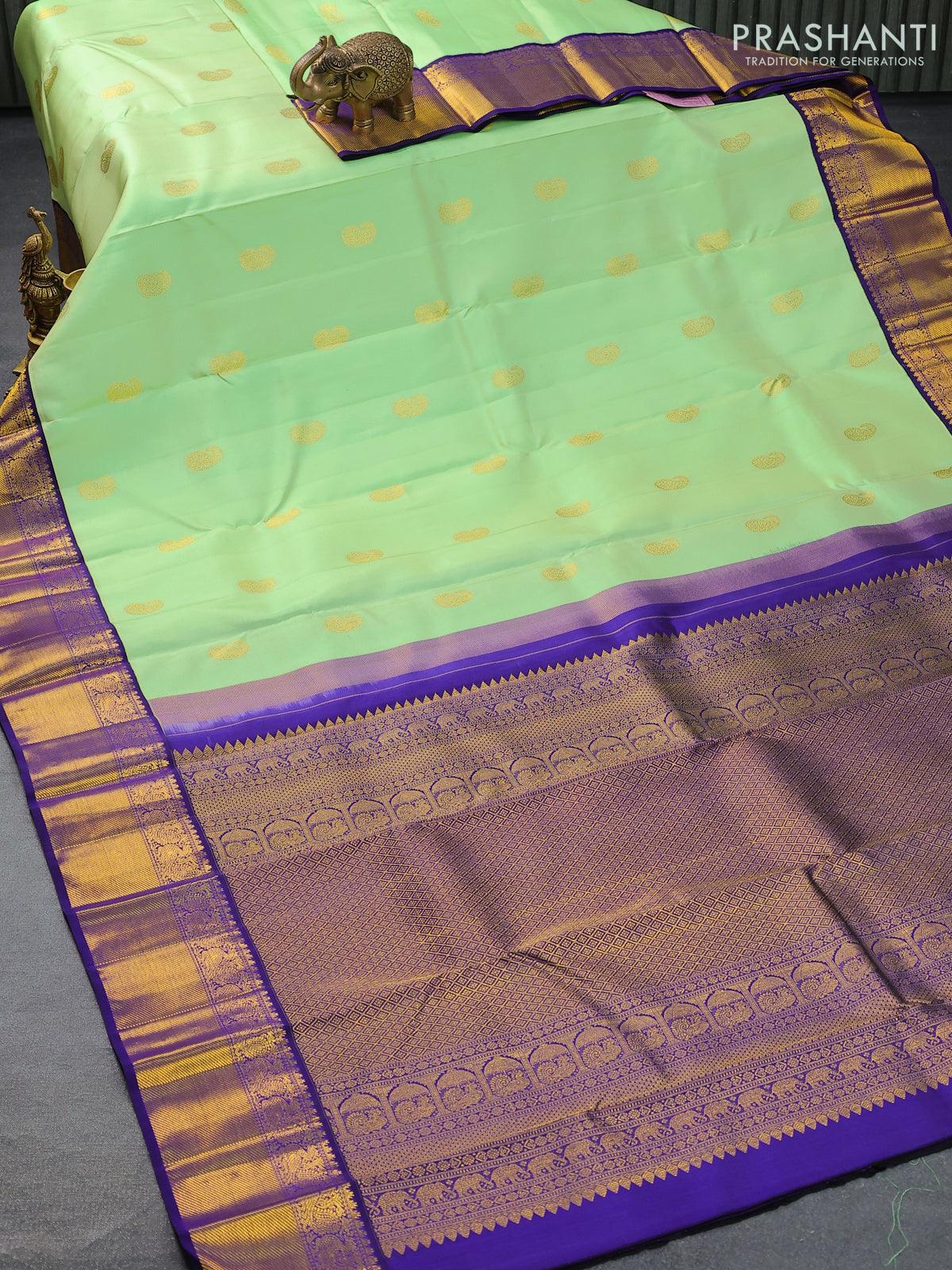 Niraa-2 Pure kanjivaram silk saree pista green and navy blue with allover zari woven paisley buttas and rich annam zari woven korvai border - Image 4