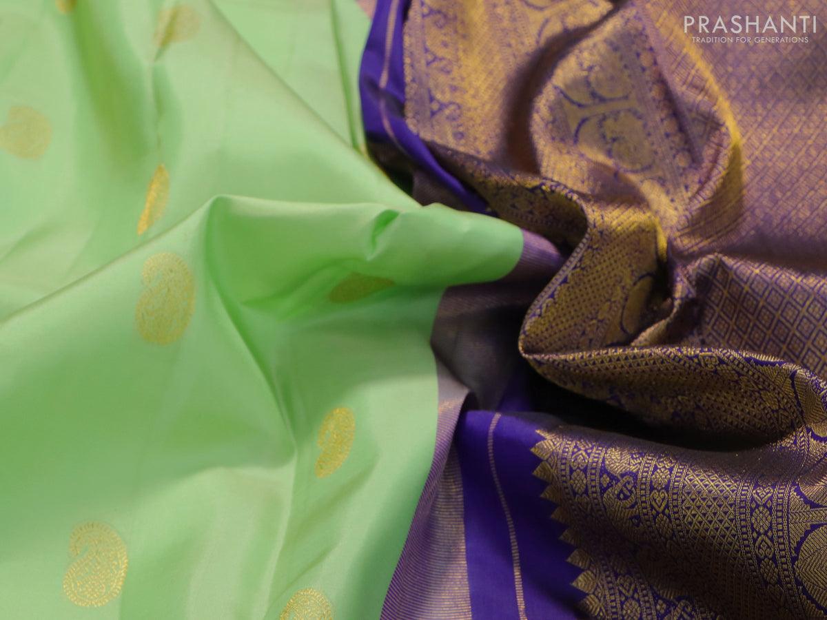 Niraa-2 Pure kanjivaram silk saree pista green and navy blue with allover zari woven paisley buttas and rich annam zari woven korvai border - Image 5