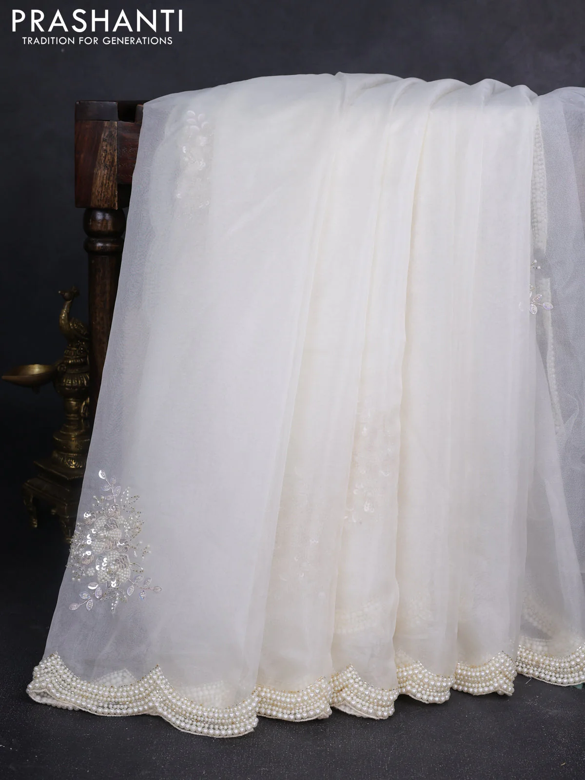 Organza silk saree off white with allover floral embroidery sequin work and beaded work border