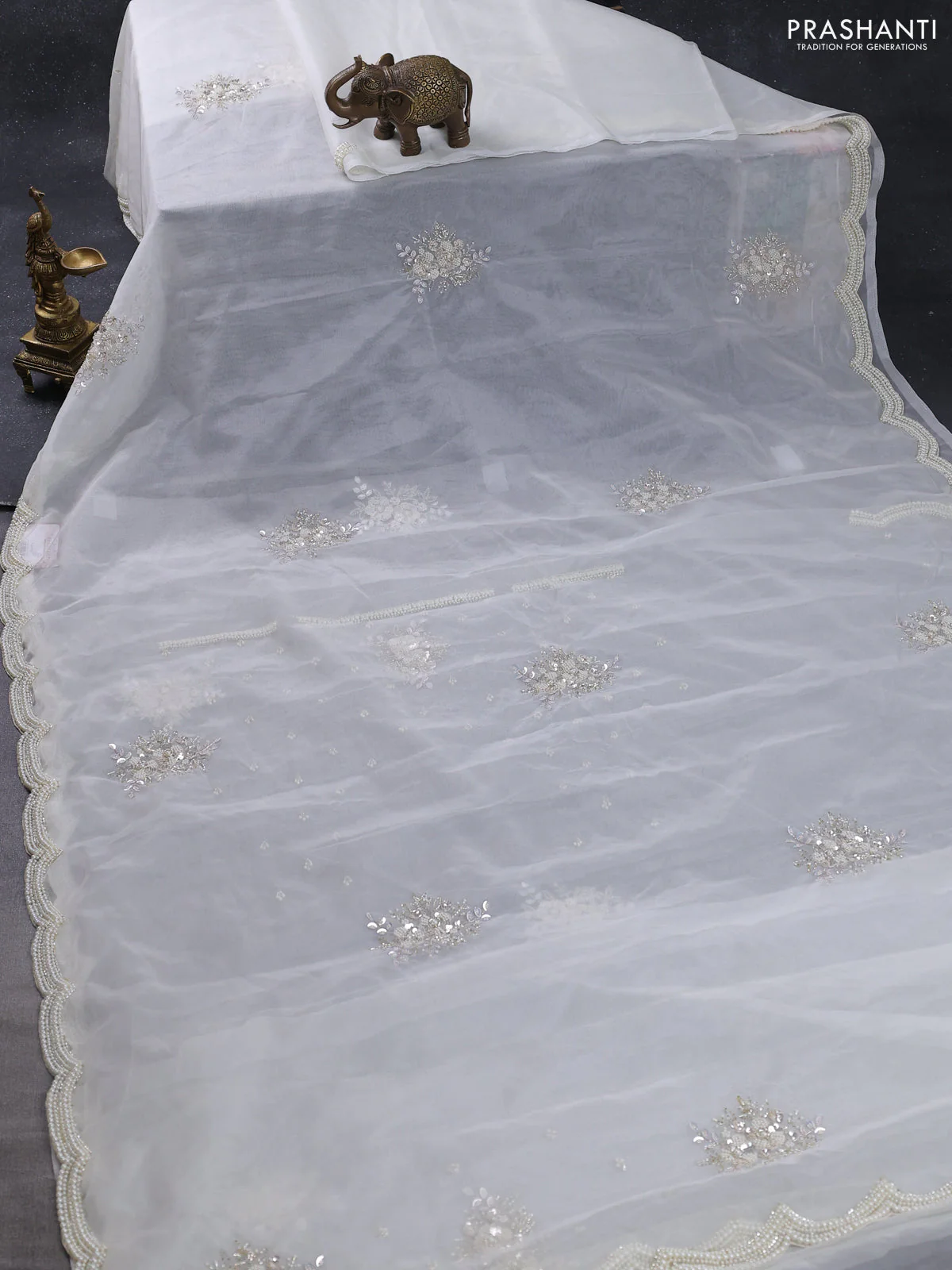 Organza silk saree off white with allover floral embroidery sequin work and beaded work border - Image 2