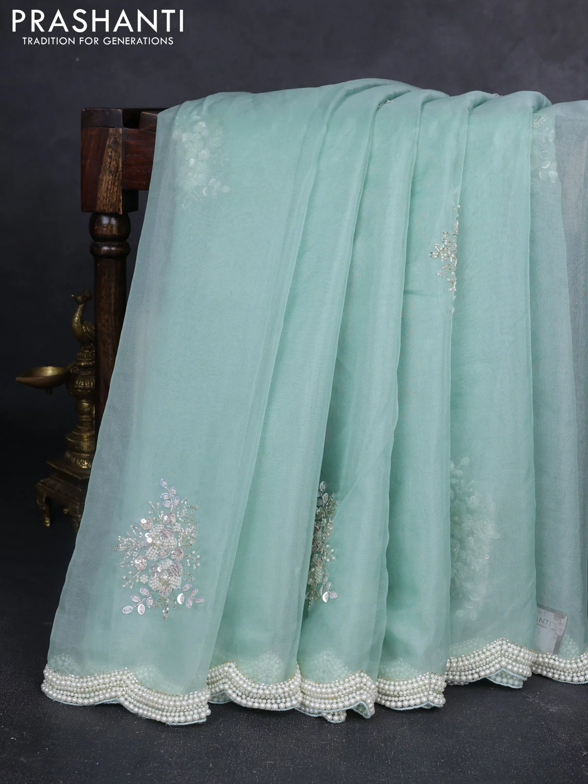 Organza silk saree pastel blue with allover floral embroidery sequin work and beaded work border