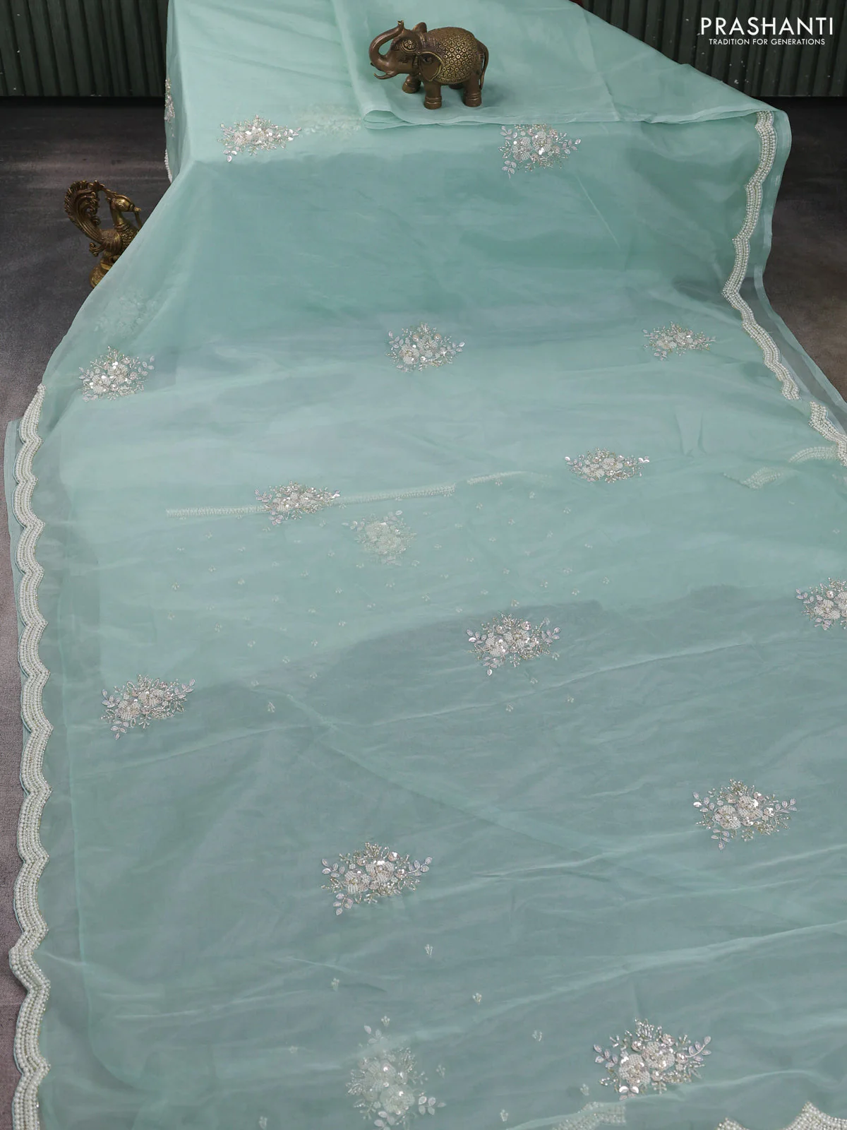 Organza silk saree pastel blue with allover floral embroidery sequin work and beaded work border - Image 2
