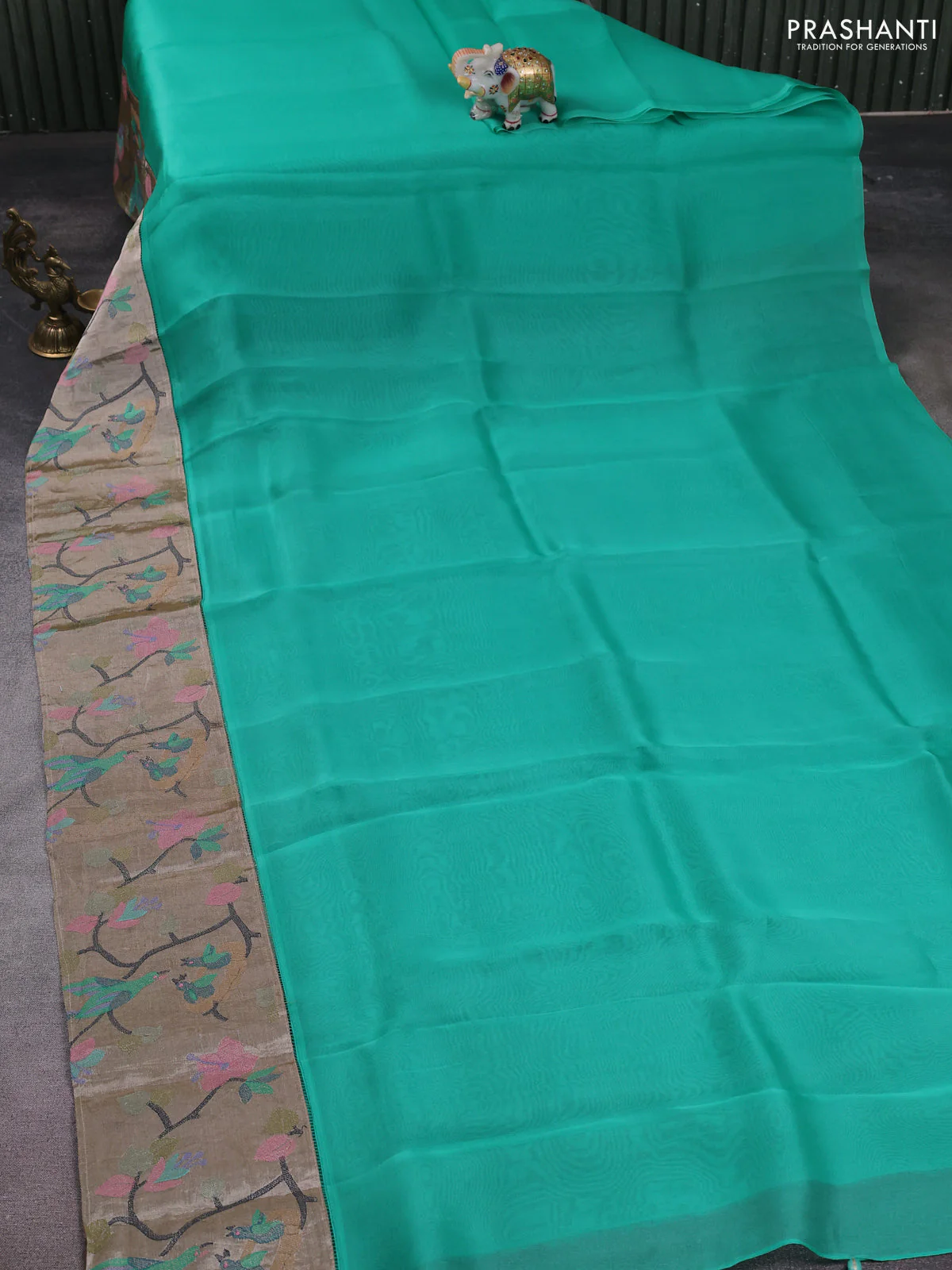 Organza silk saree teal green with plain body and embroidery border - Image 3