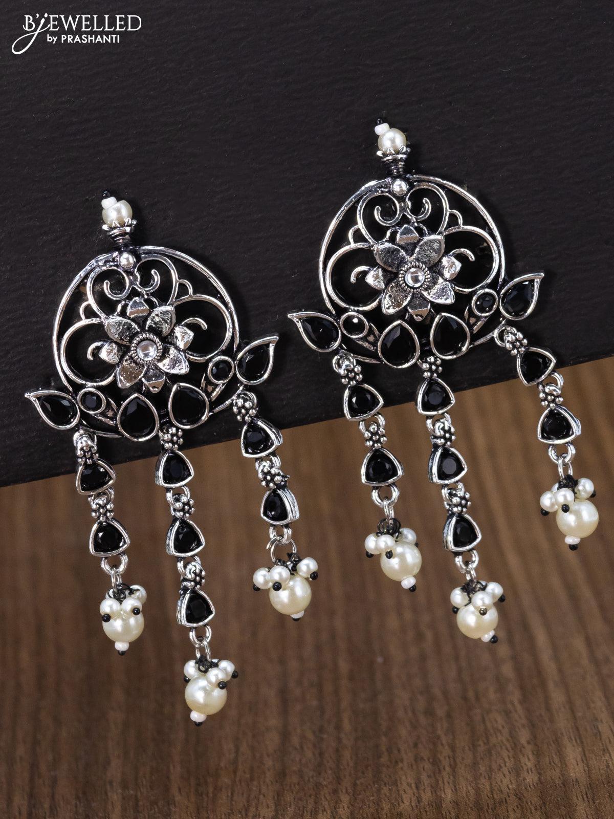 Oxidised earring floral design with black stone and pearl hangings