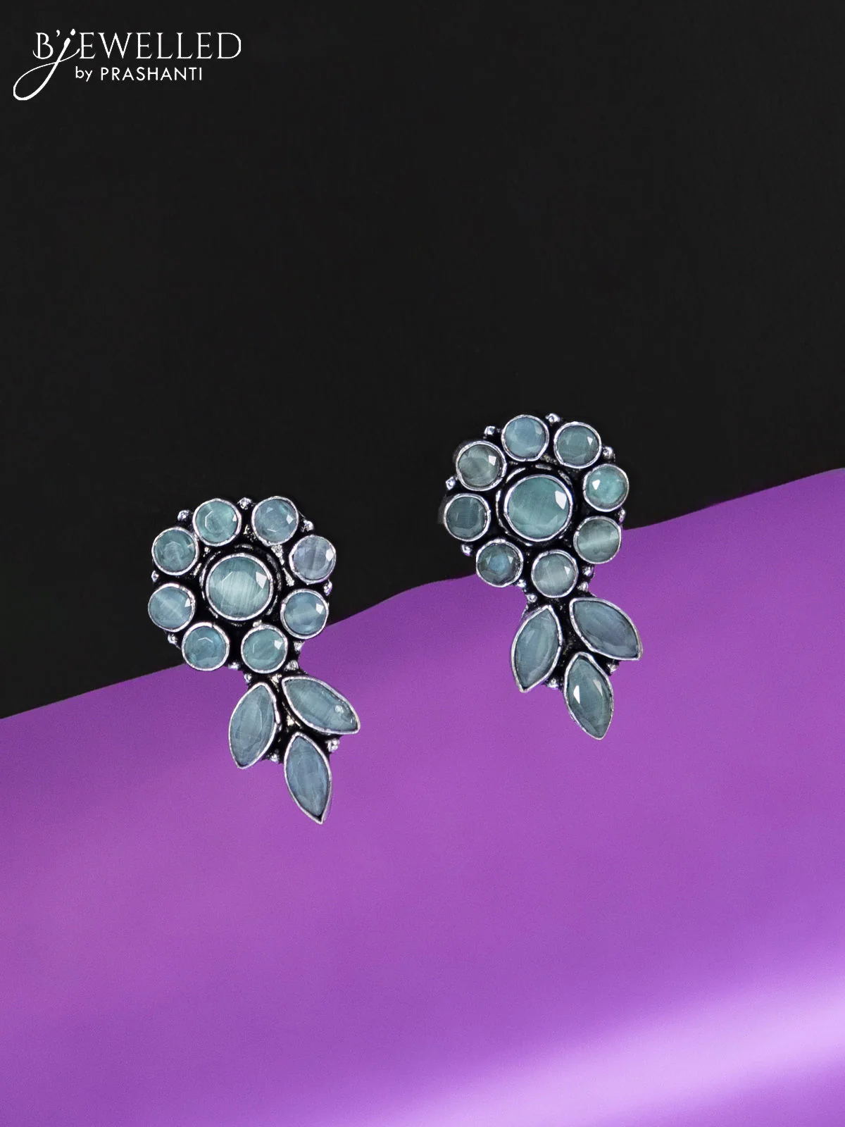 Oxidised earrings with mint green stones