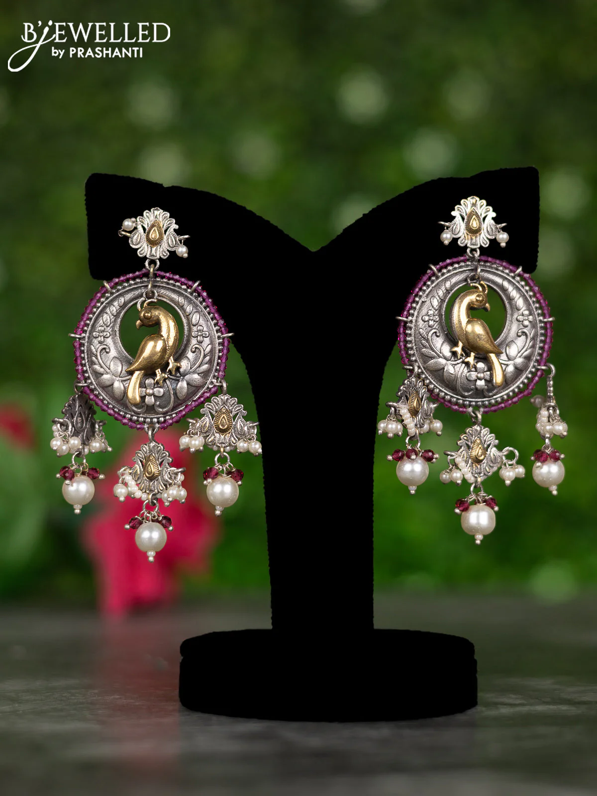 Oxidised earrings with peacock design and pearl & pink beads hangings