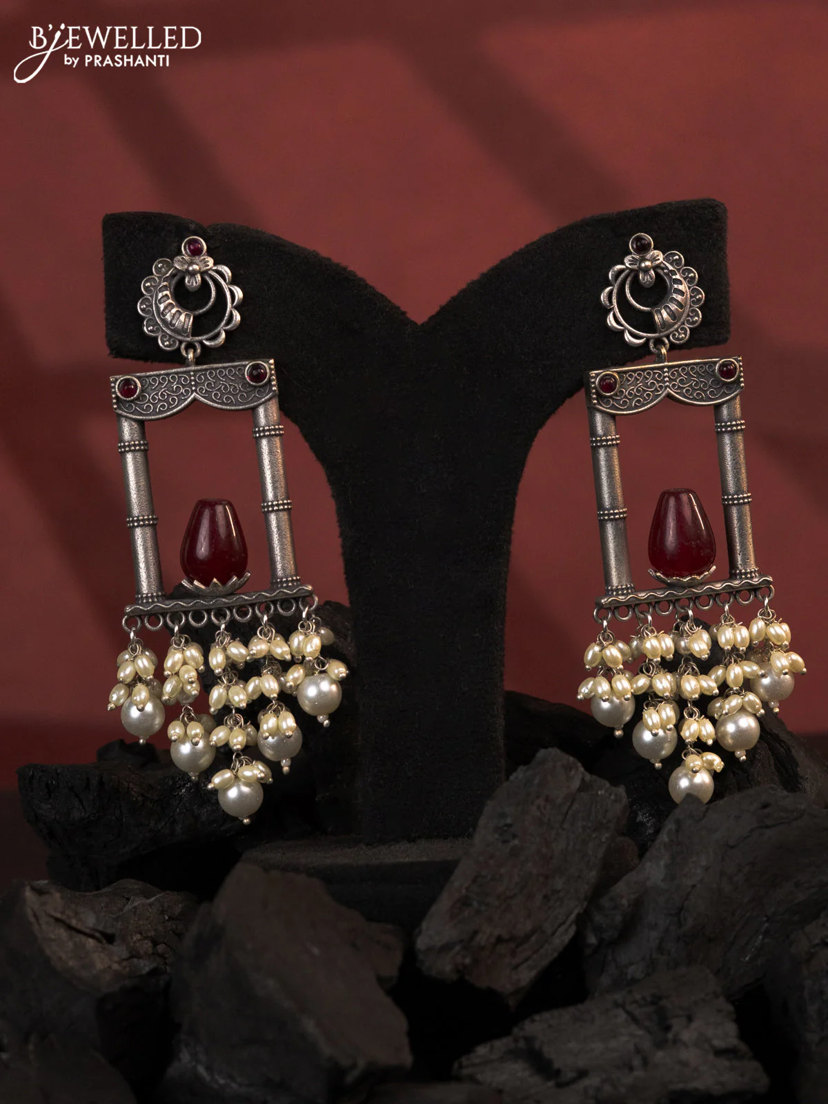 Oxidised earrings with ruby stones and pearl hangings