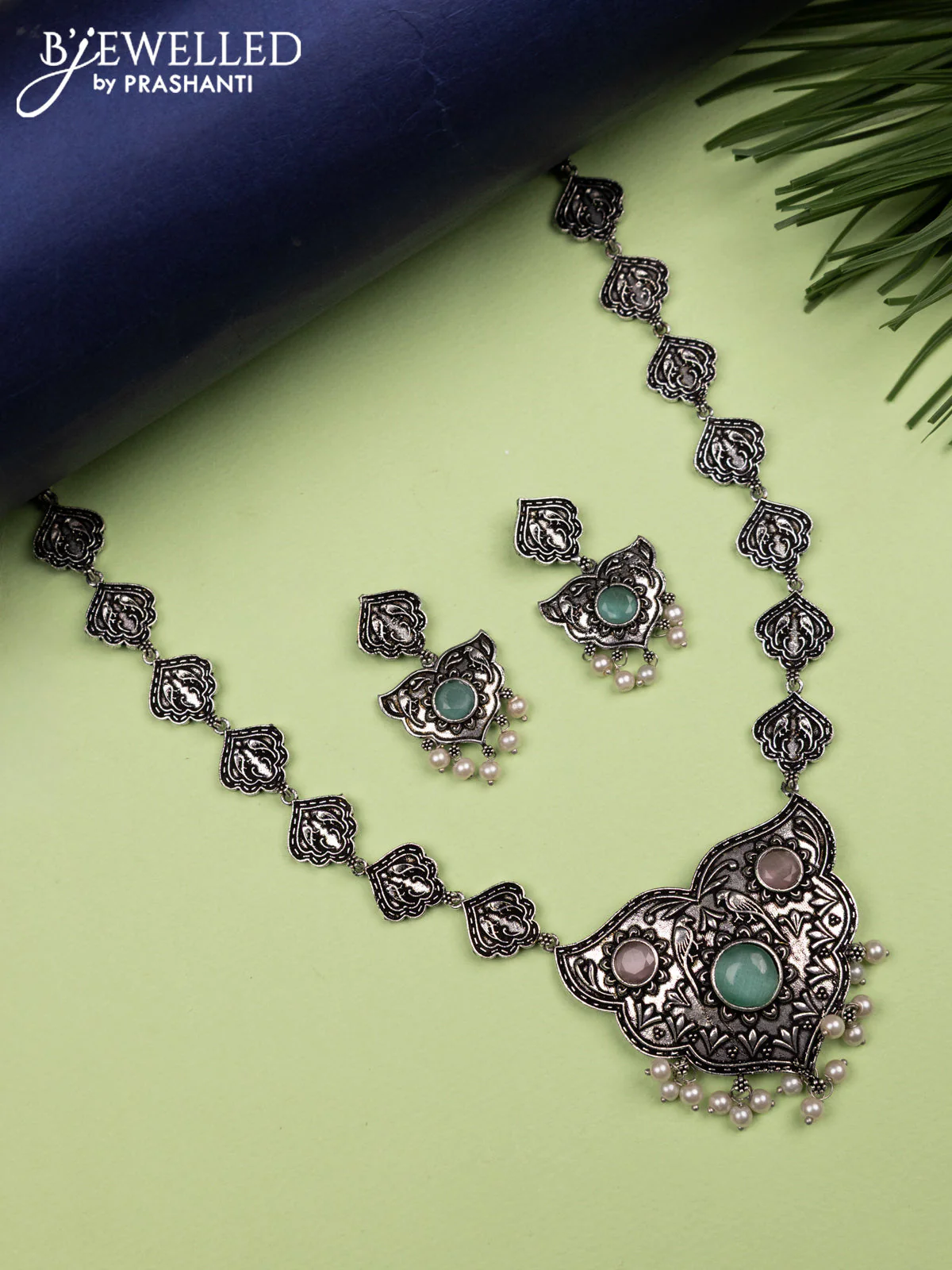 Oxidised haaram with mint green & baby pink stones and pearl hangings