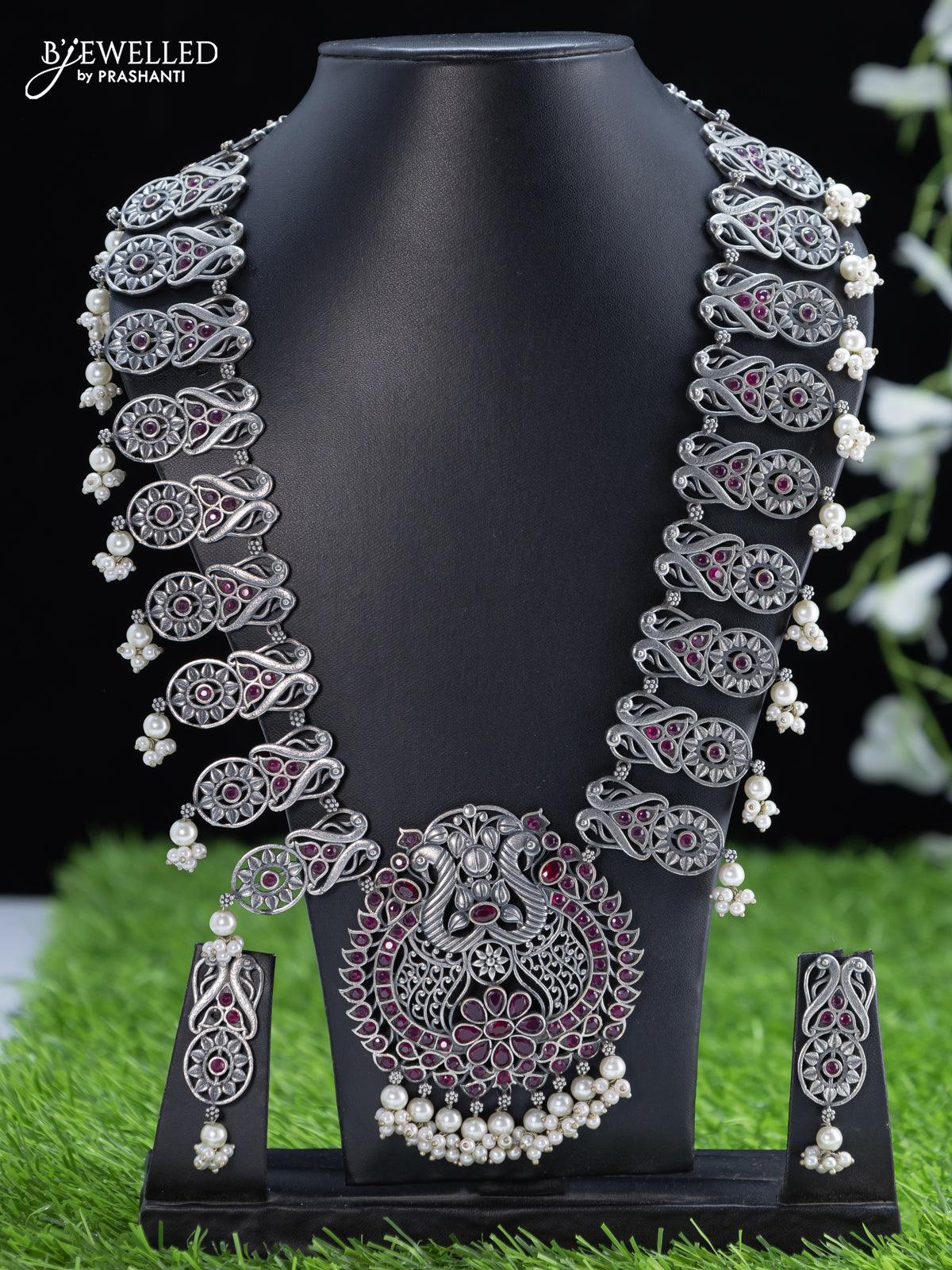 Oxidised haaram with pink kemp stone and pearl hangings