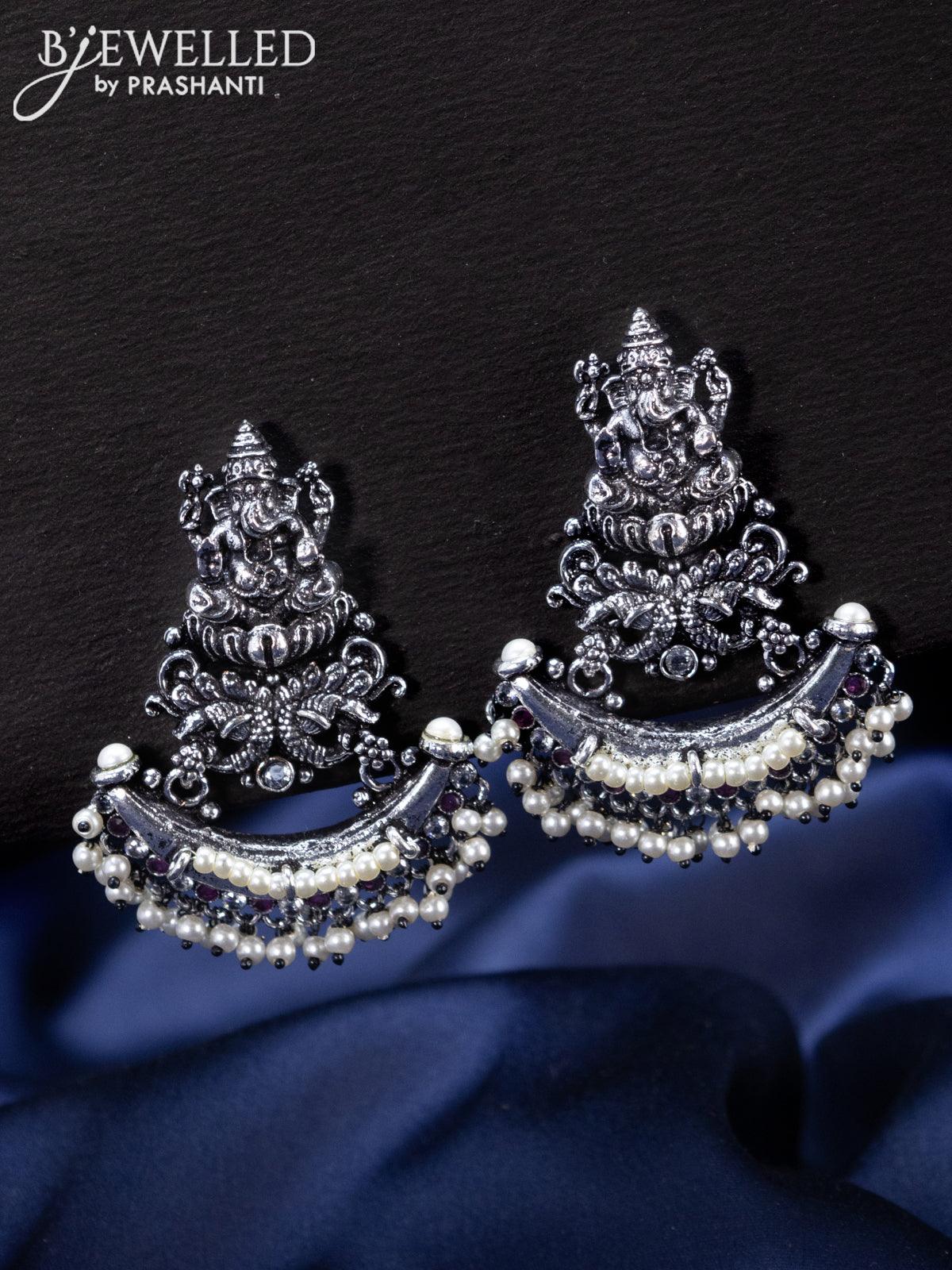 Oxidised Earrings ganesha design with ruby & cz stones and pearl hangings