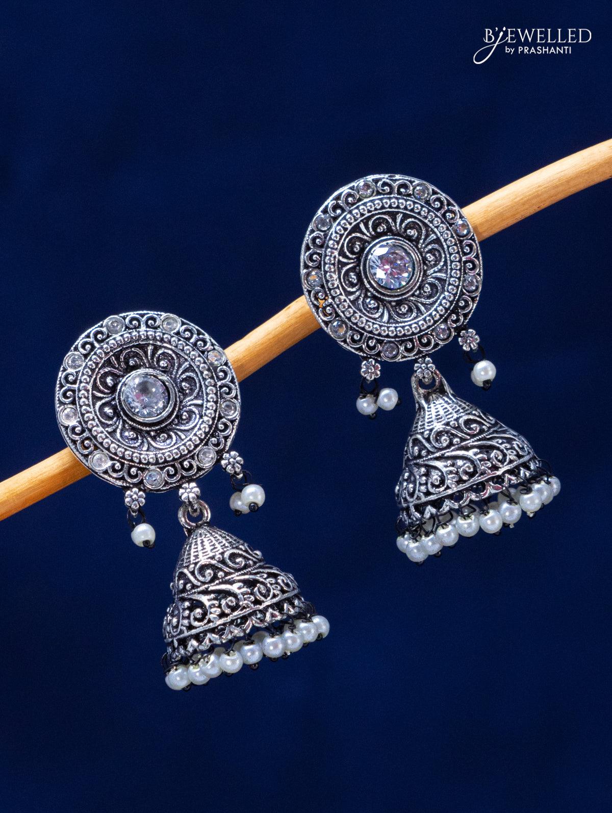 Oxidised jhumka with cz stones and pearl hangings