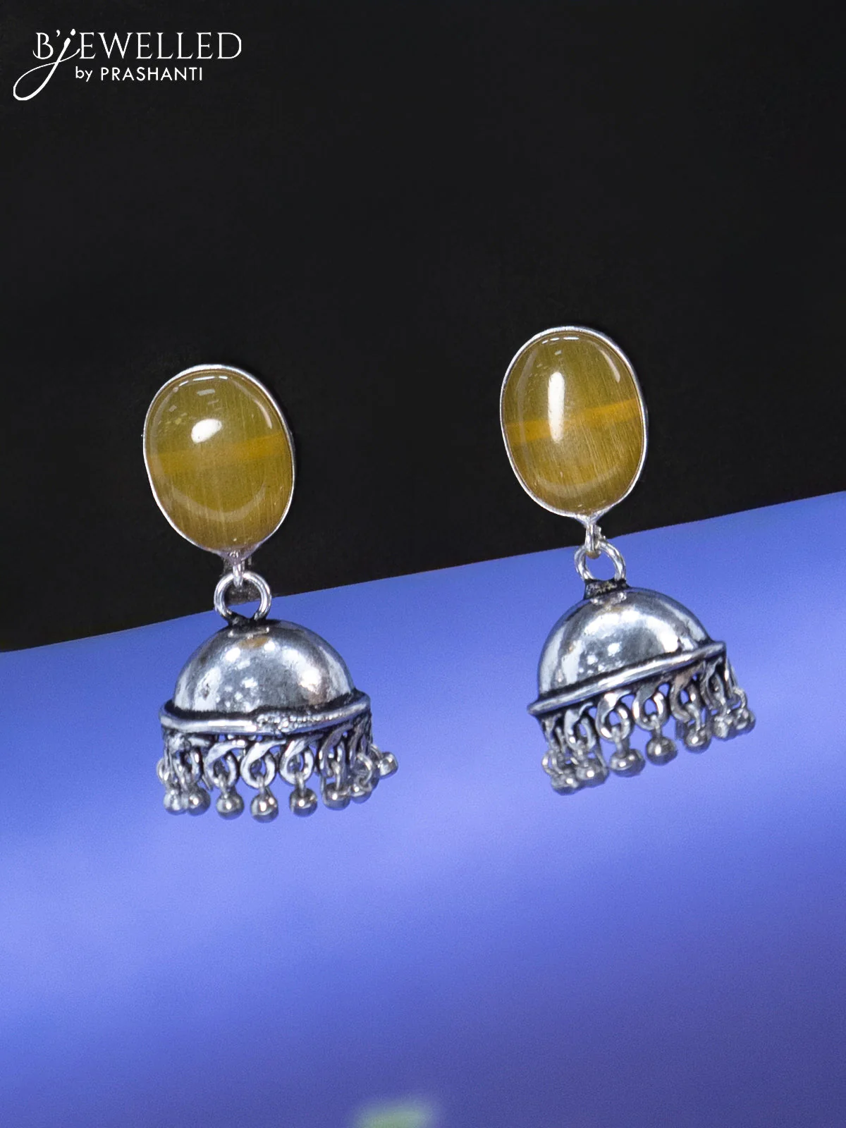 Oxidised jhumka with yellow stone and hangings