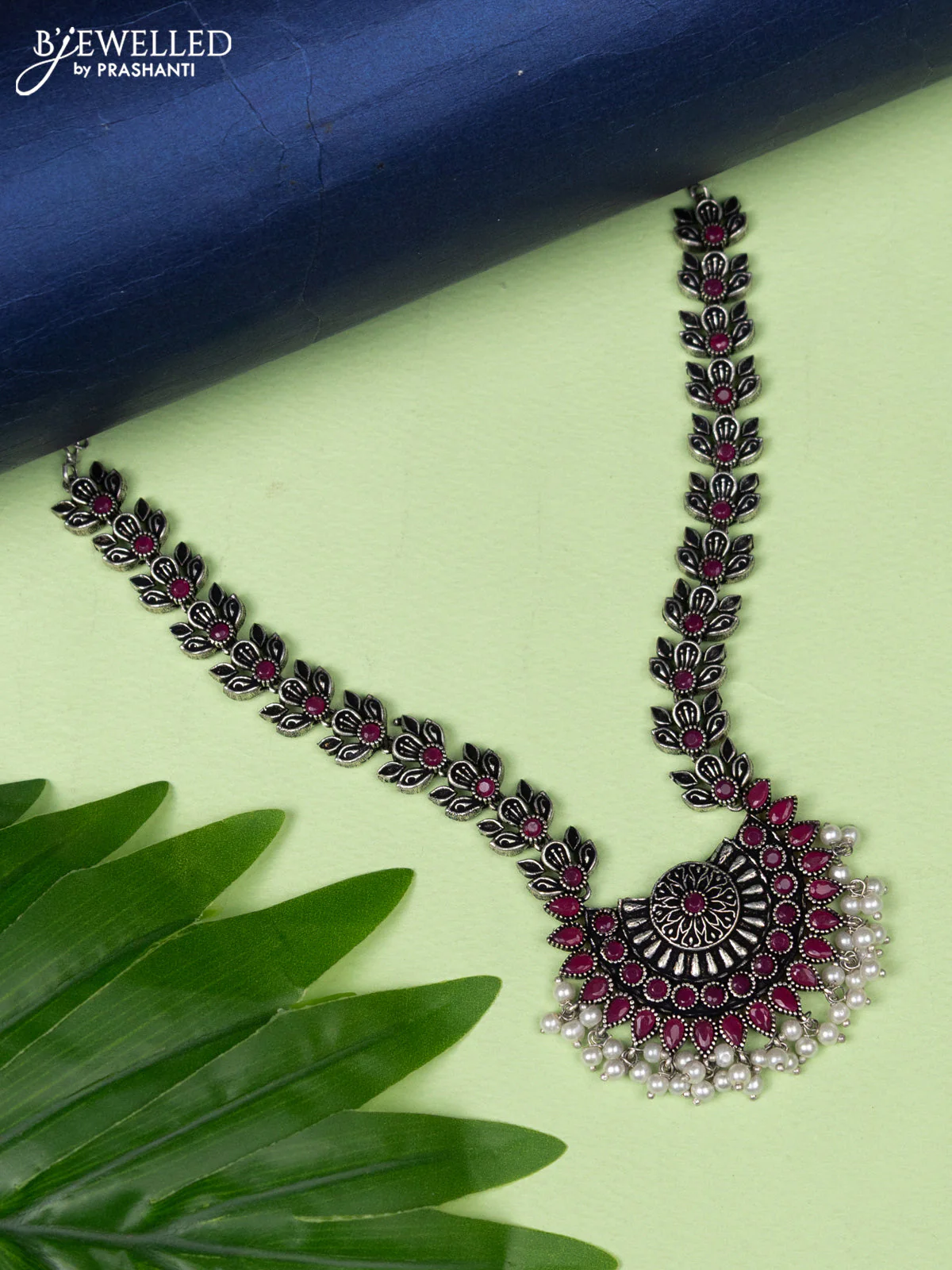 Oxidised necklace floral design with ruby stone and pearl hangings without earring