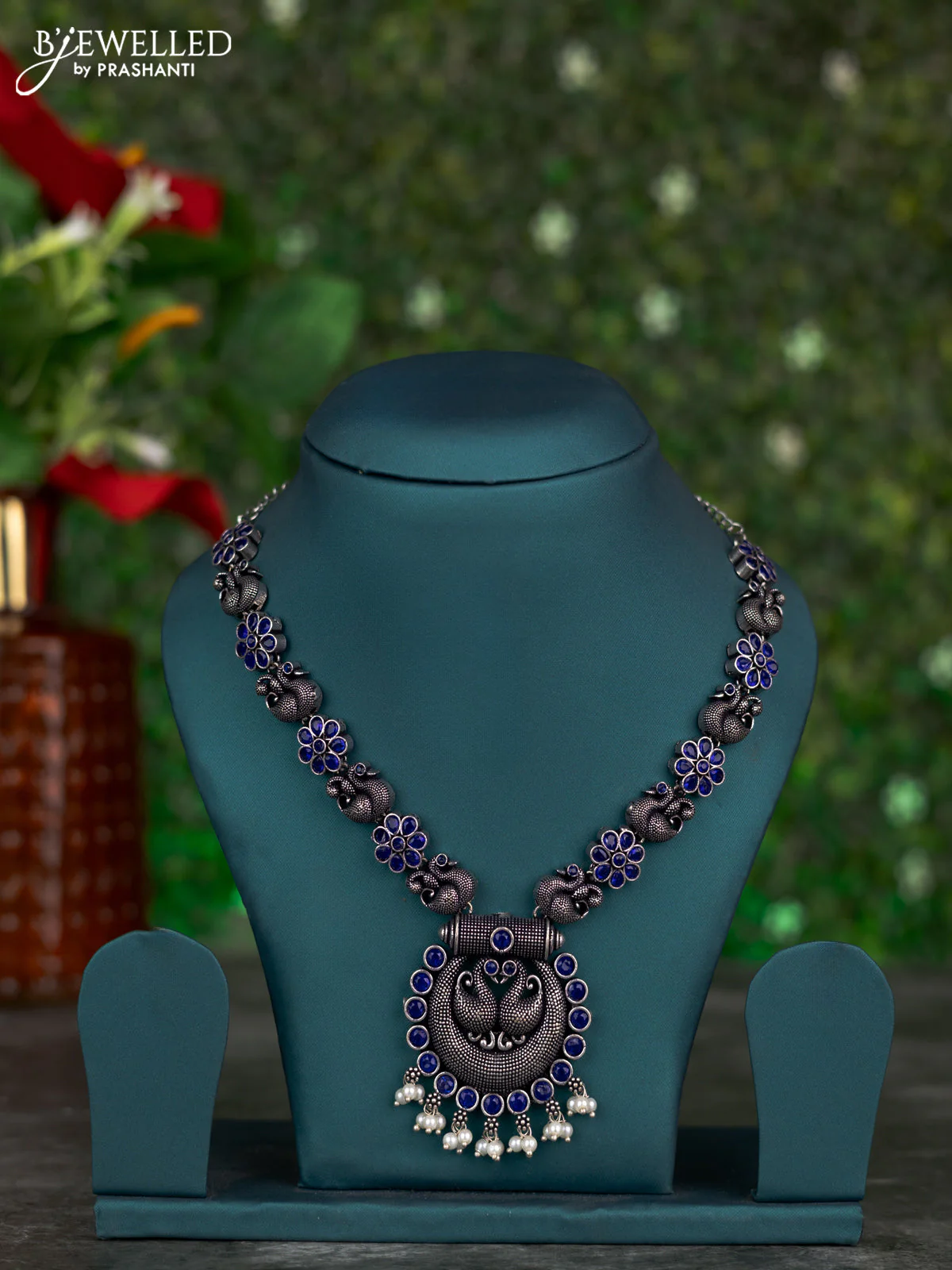 Oxidised necklace swan design with sapphire stones and pearl hangings without earring