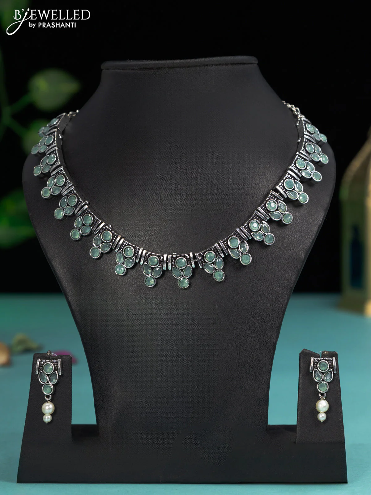 Oxidised necklace with mint green stones