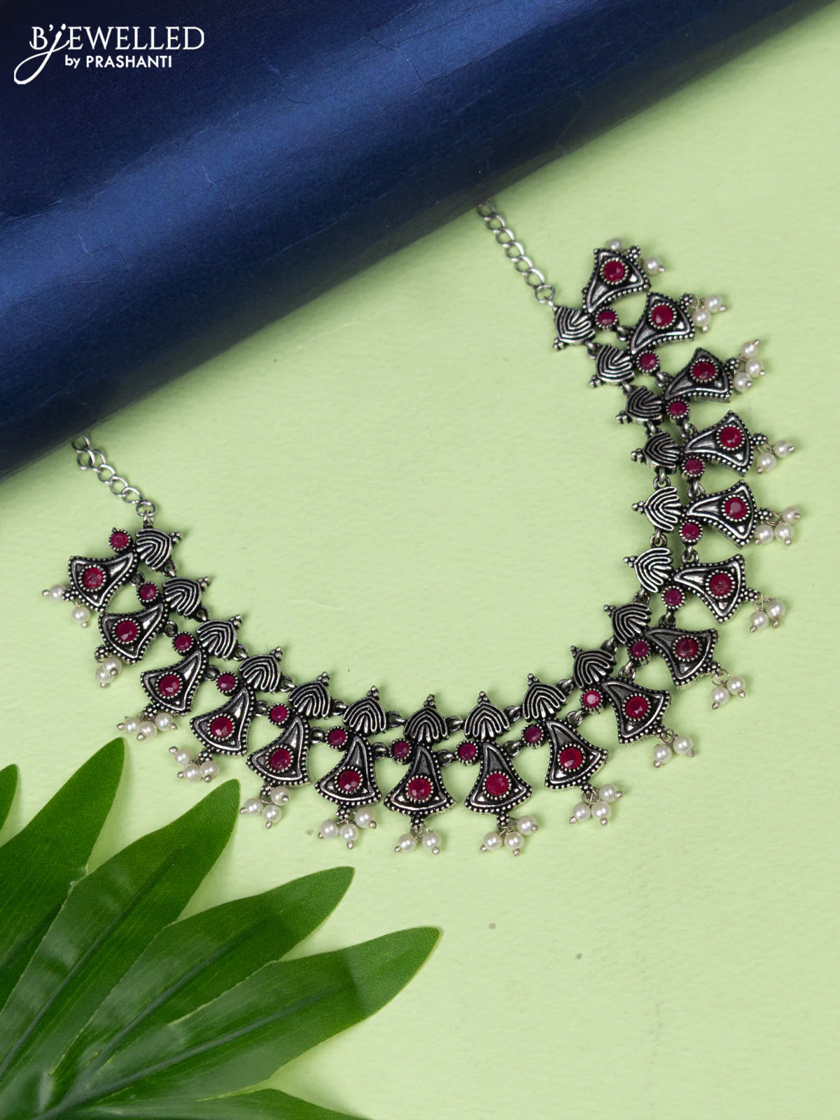 Oxidised necklace with pink kemp stones and pearl hangings without earring
