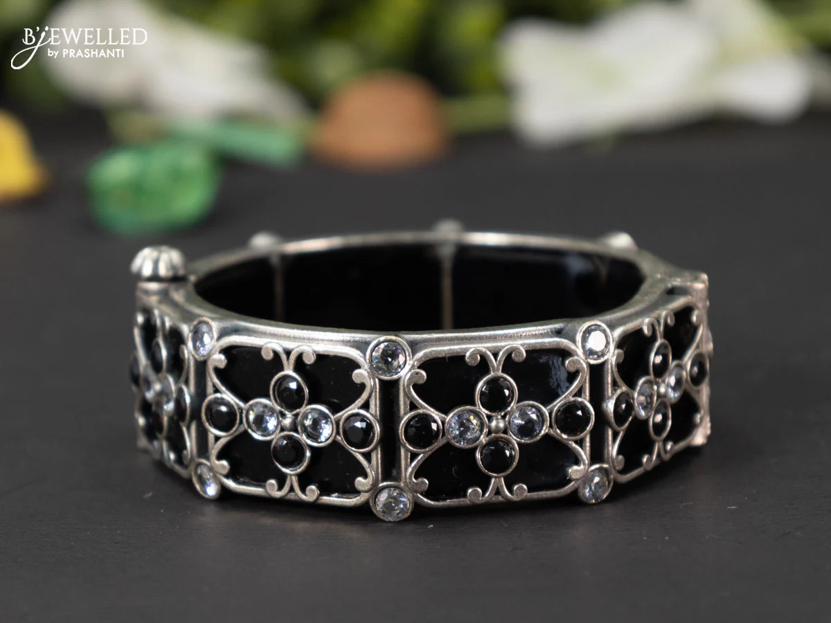 Oxidised screw type bangle with black and cz stones