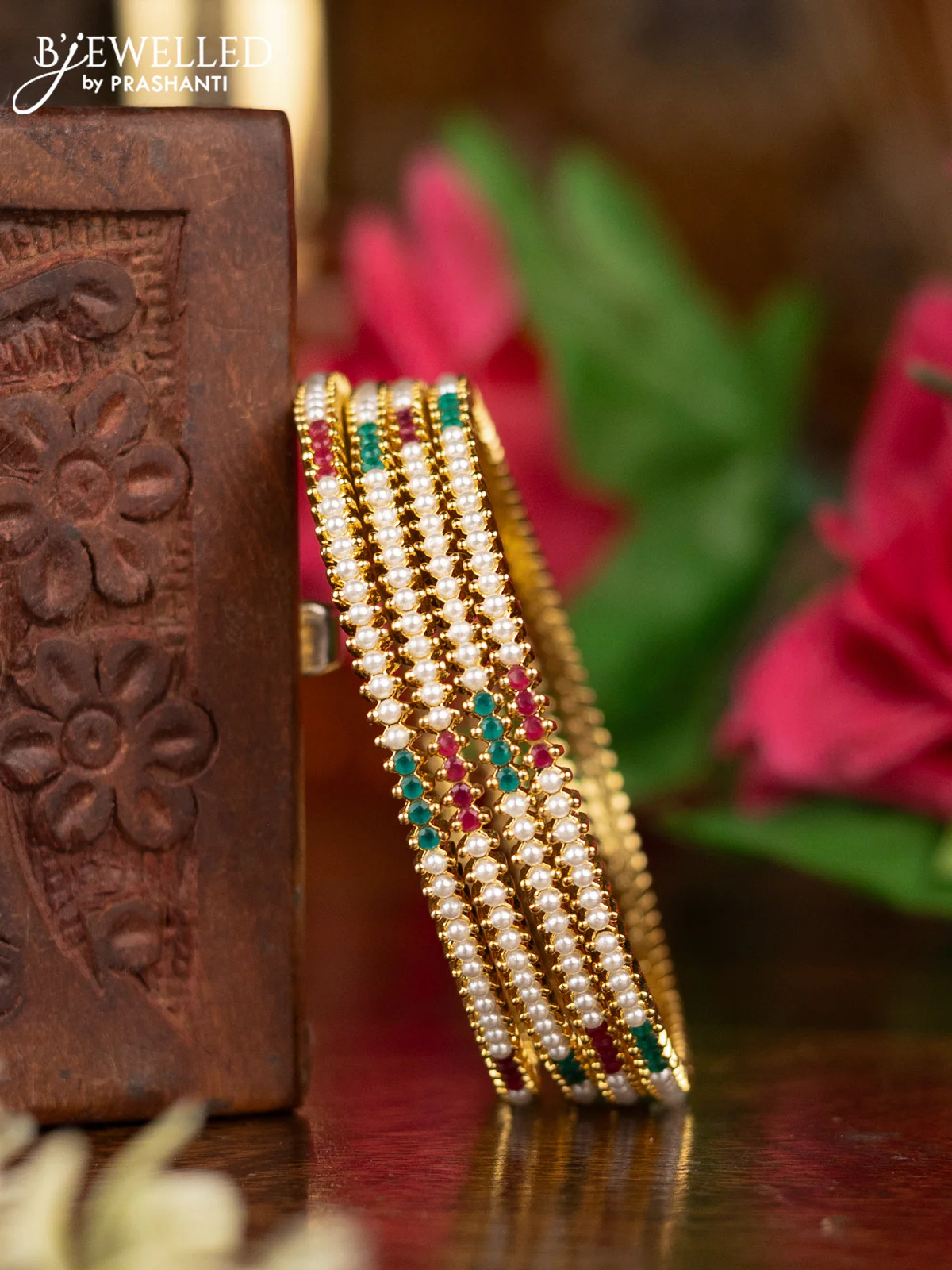 Pearl Bangles with kemp stones pearls in gold finish