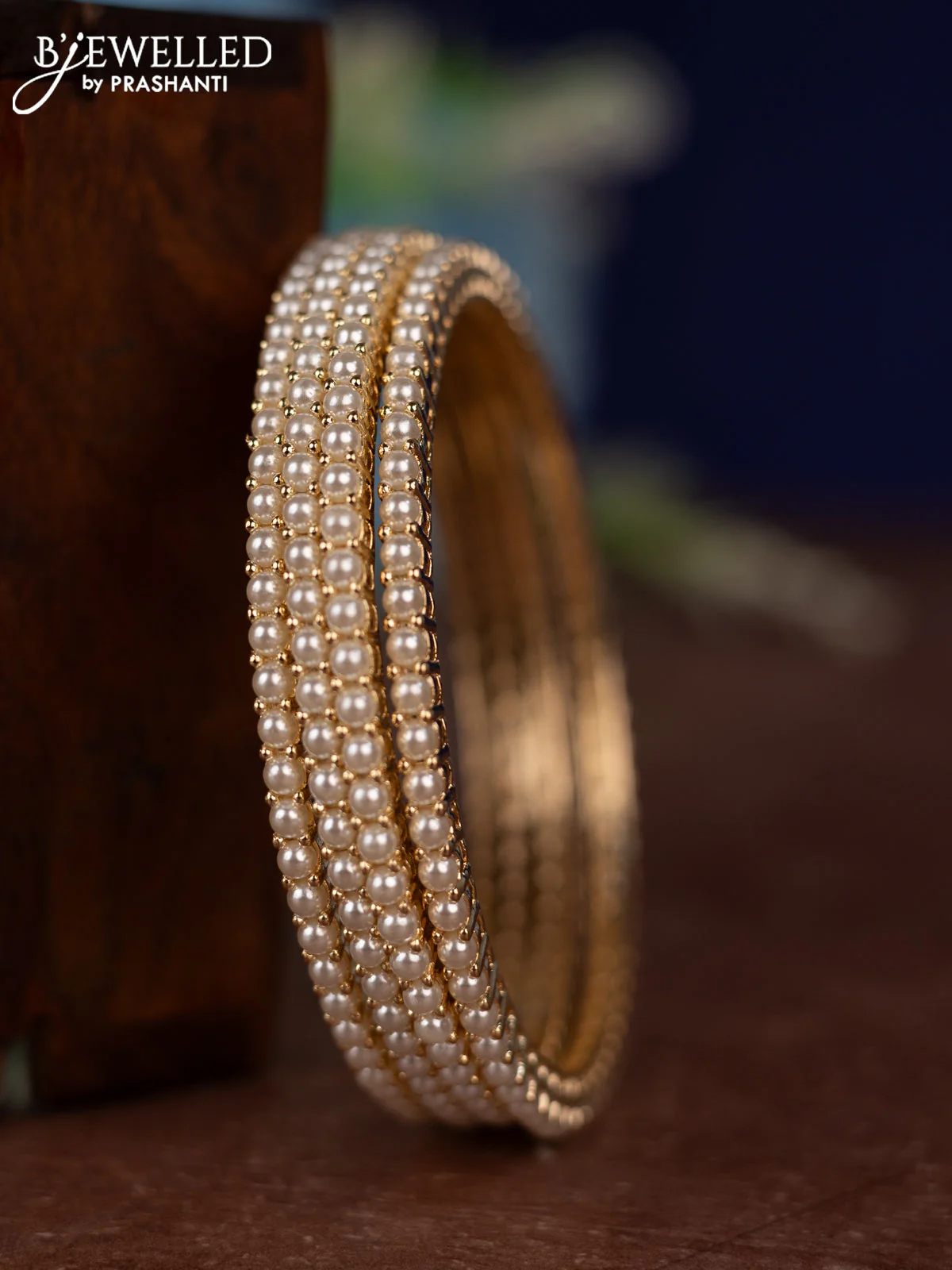 Pearl Bangles with pearls in gold finish