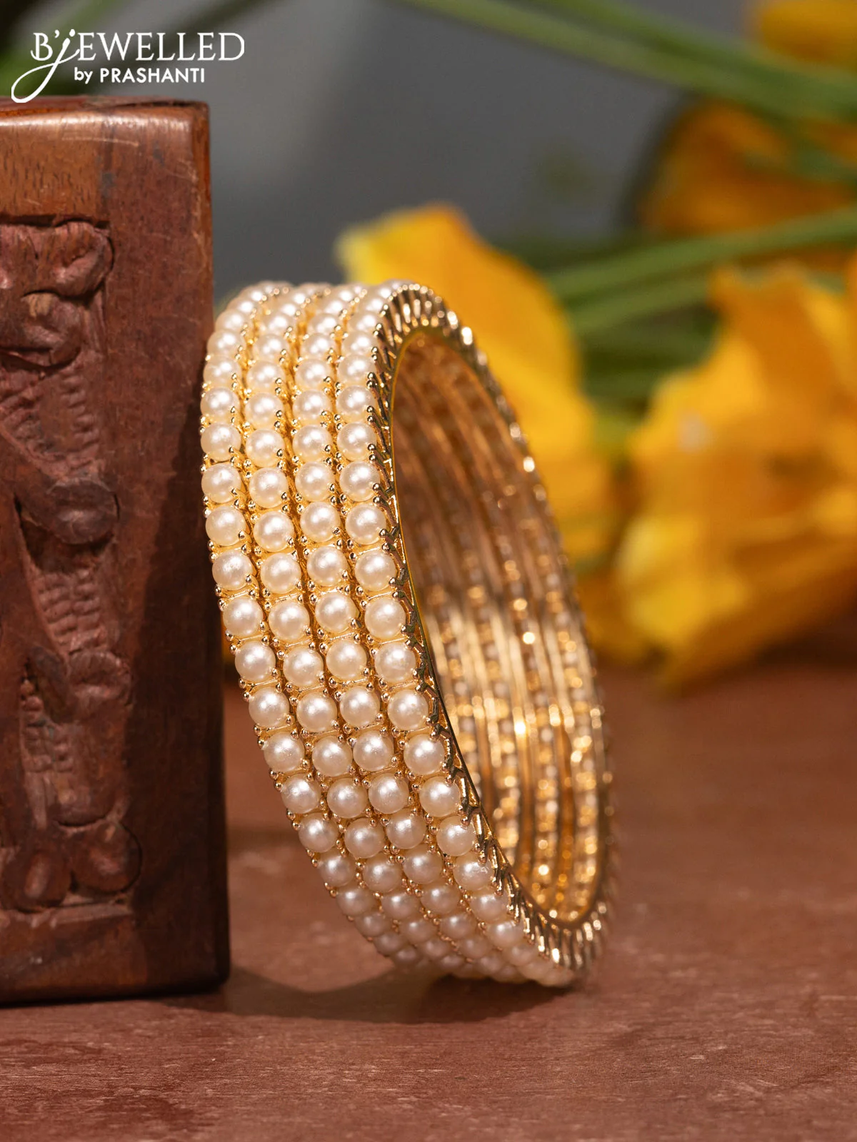 Pearl Bangles with pearls in gold finish