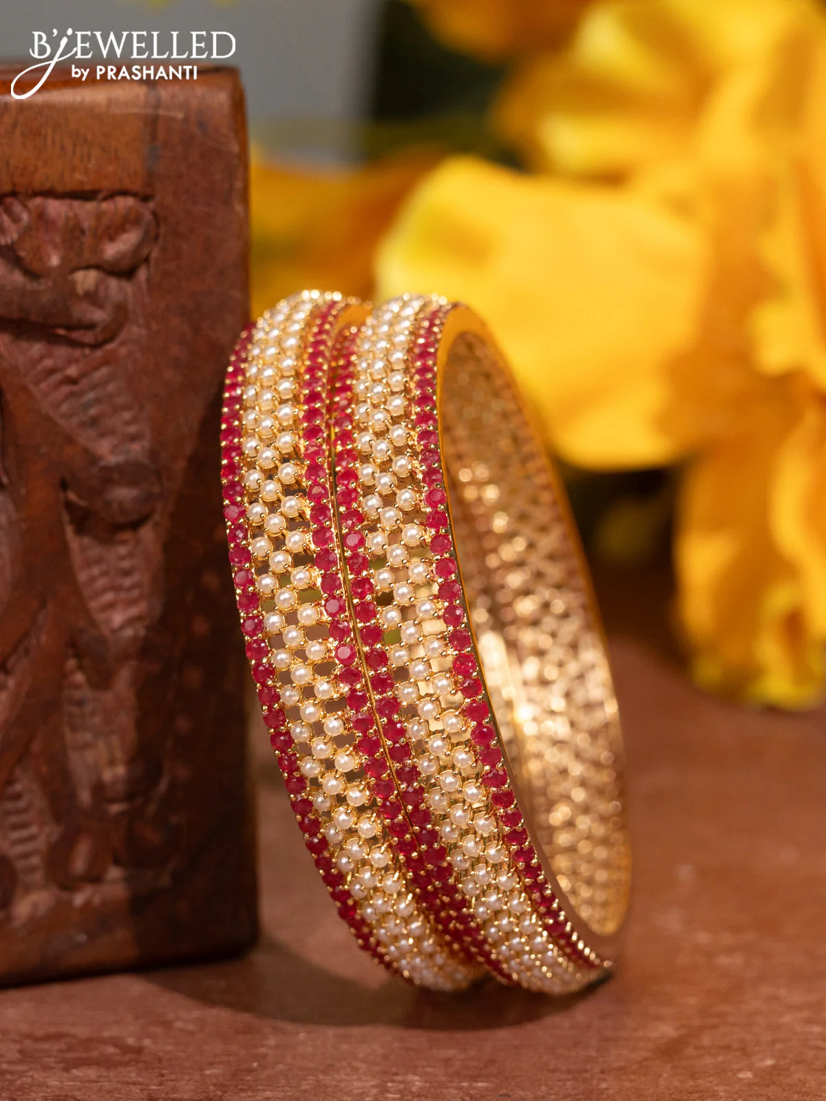Pearl Bangles with ruby stones pearls in gold finish